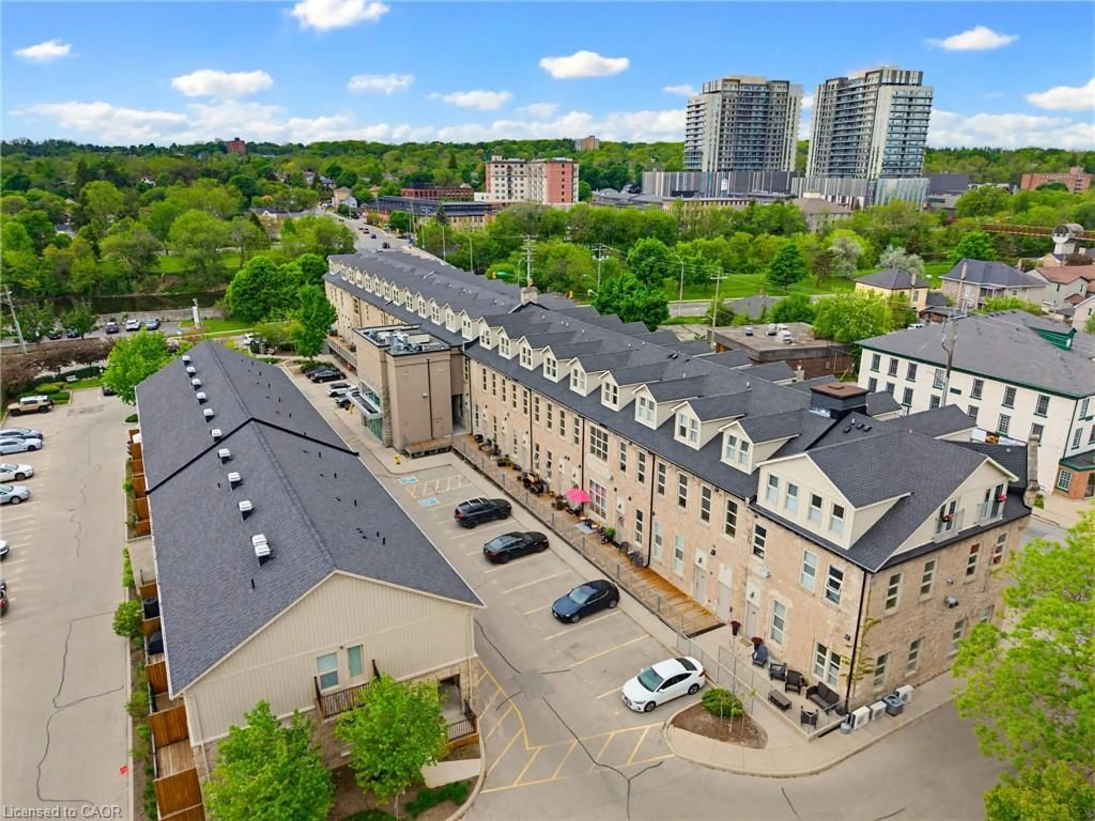 A pic from outside/outdoor area/front of a property/back of a property/a pic from drone, city buildings view from balcony for 25 Concession St #111, Cambridge Ontario N1R 2G6