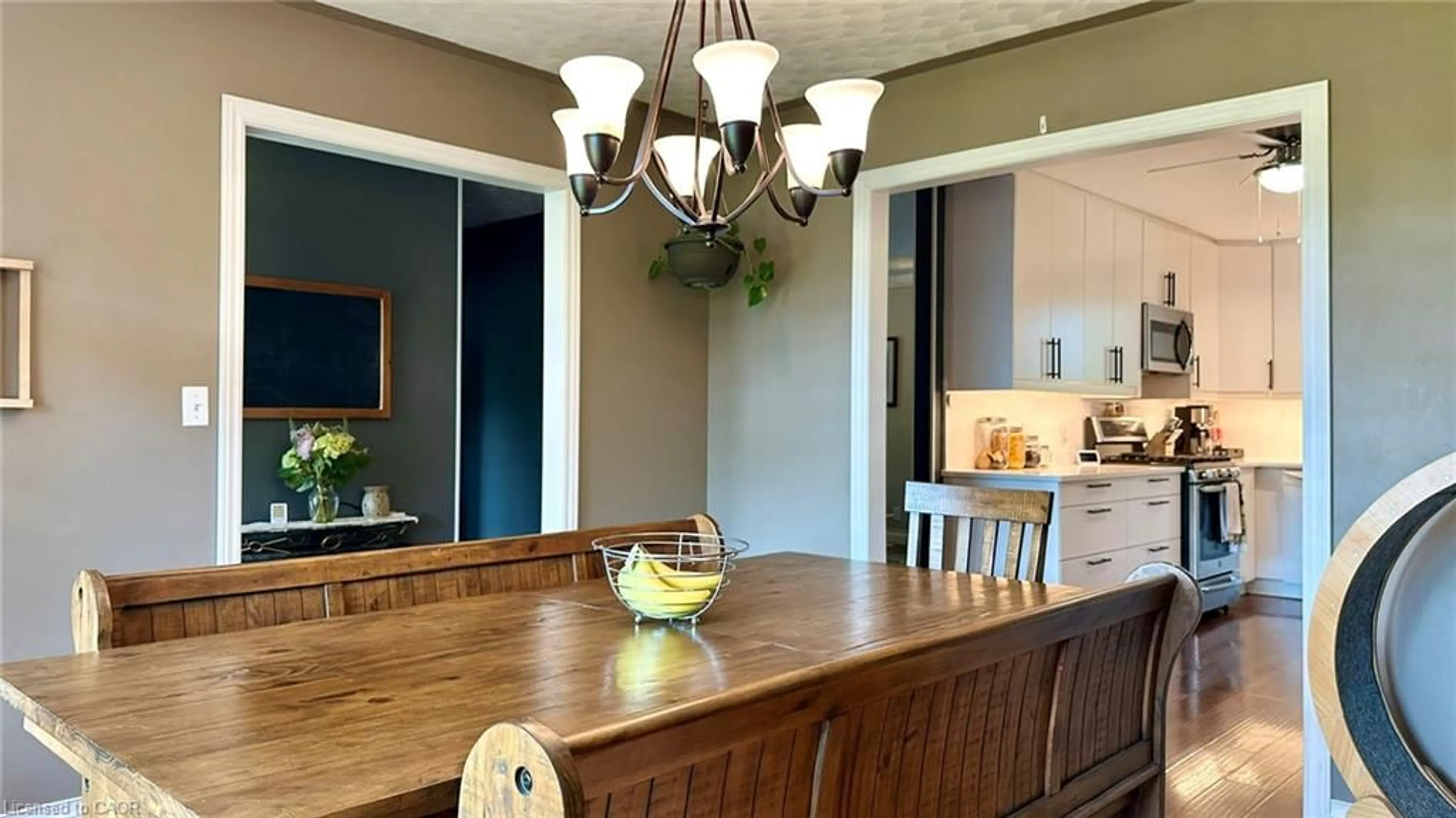 Open concept kitchen, wood/laminate floor for 10 Baltic Cir, Waterford Ontario N0E 1Y0