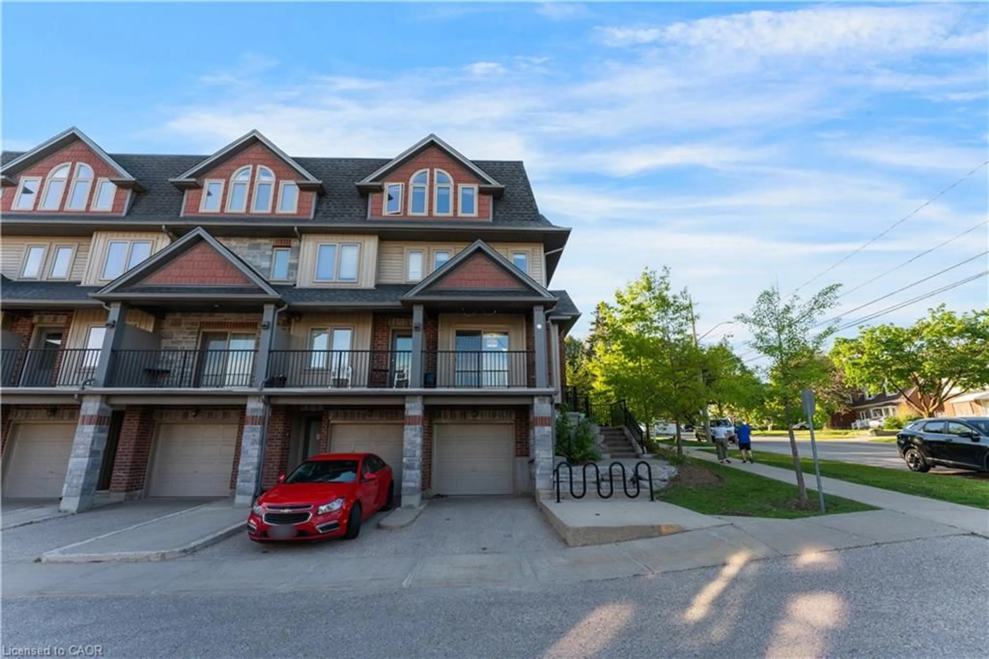 A pic from outside/outdoor area/front of a property/back of a property/a pic from drone, street for 487 East Ave #5, Kitchener Ontario N2H 0A8