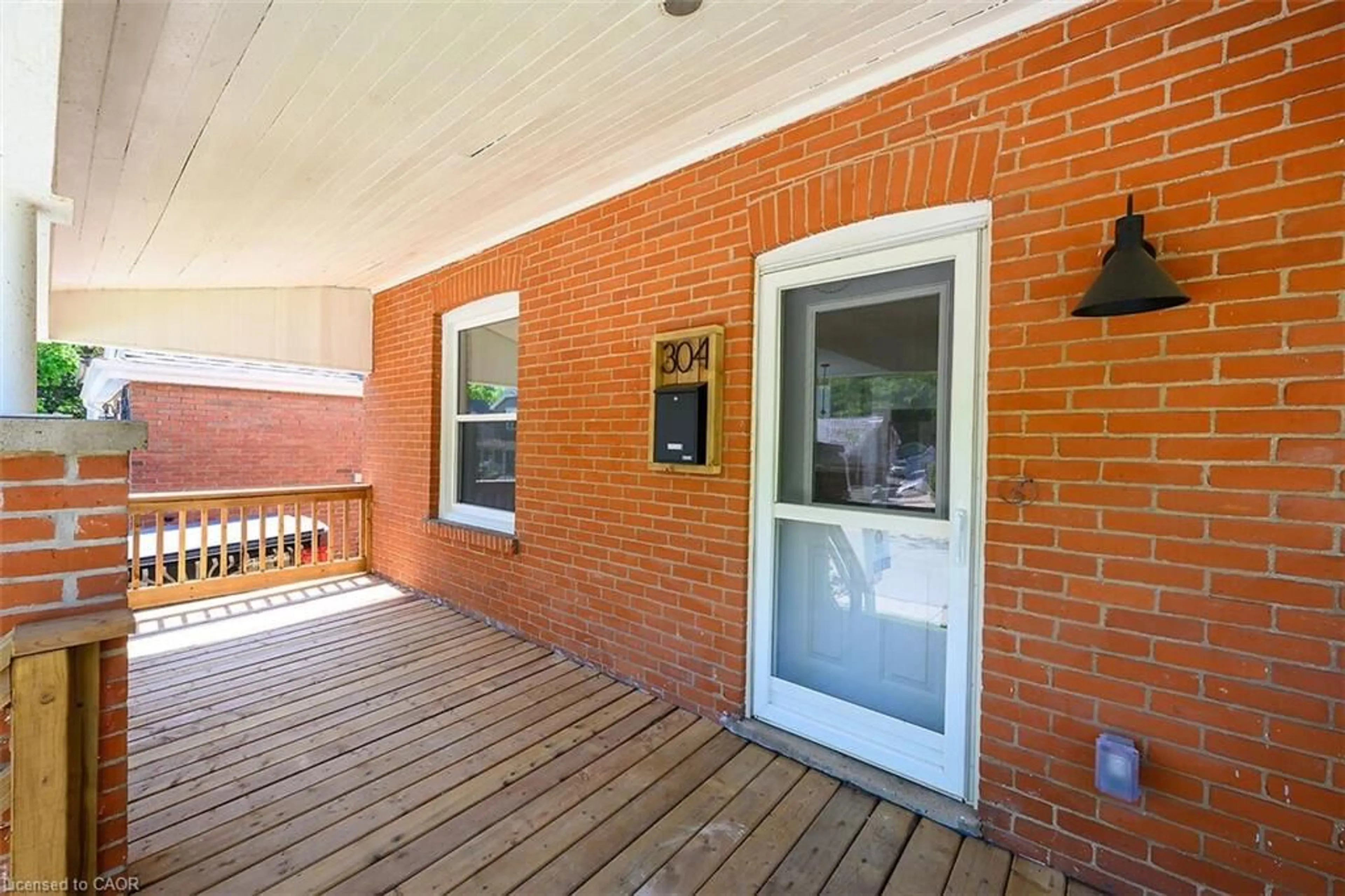 Home with brick exterior material, street for 304 Park St, Hamilton Ontario L9H 1Y9