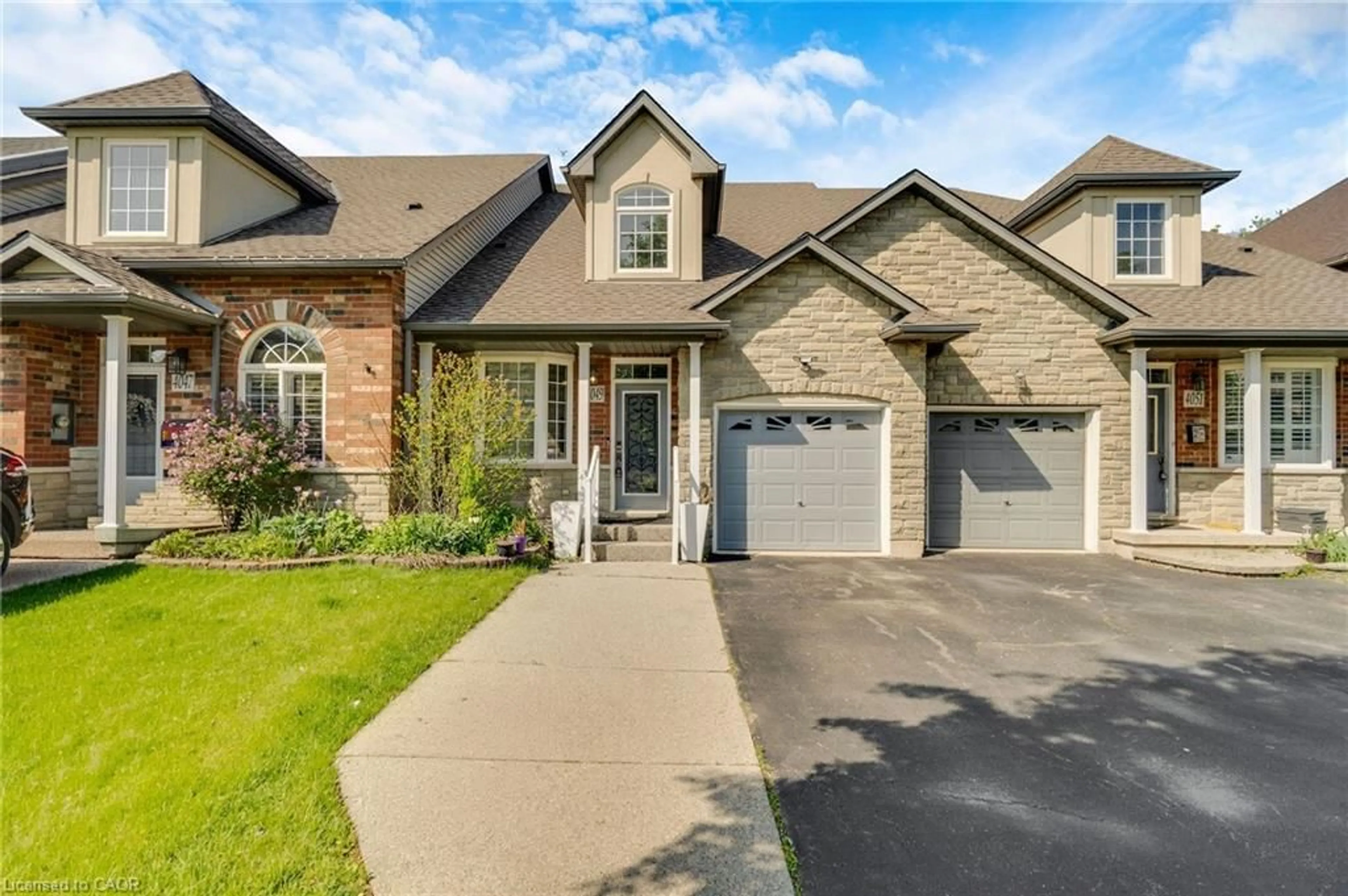 Home with brick exterior material, street for 4049 Medland Dr, Burlington Ontario L7M 4W7