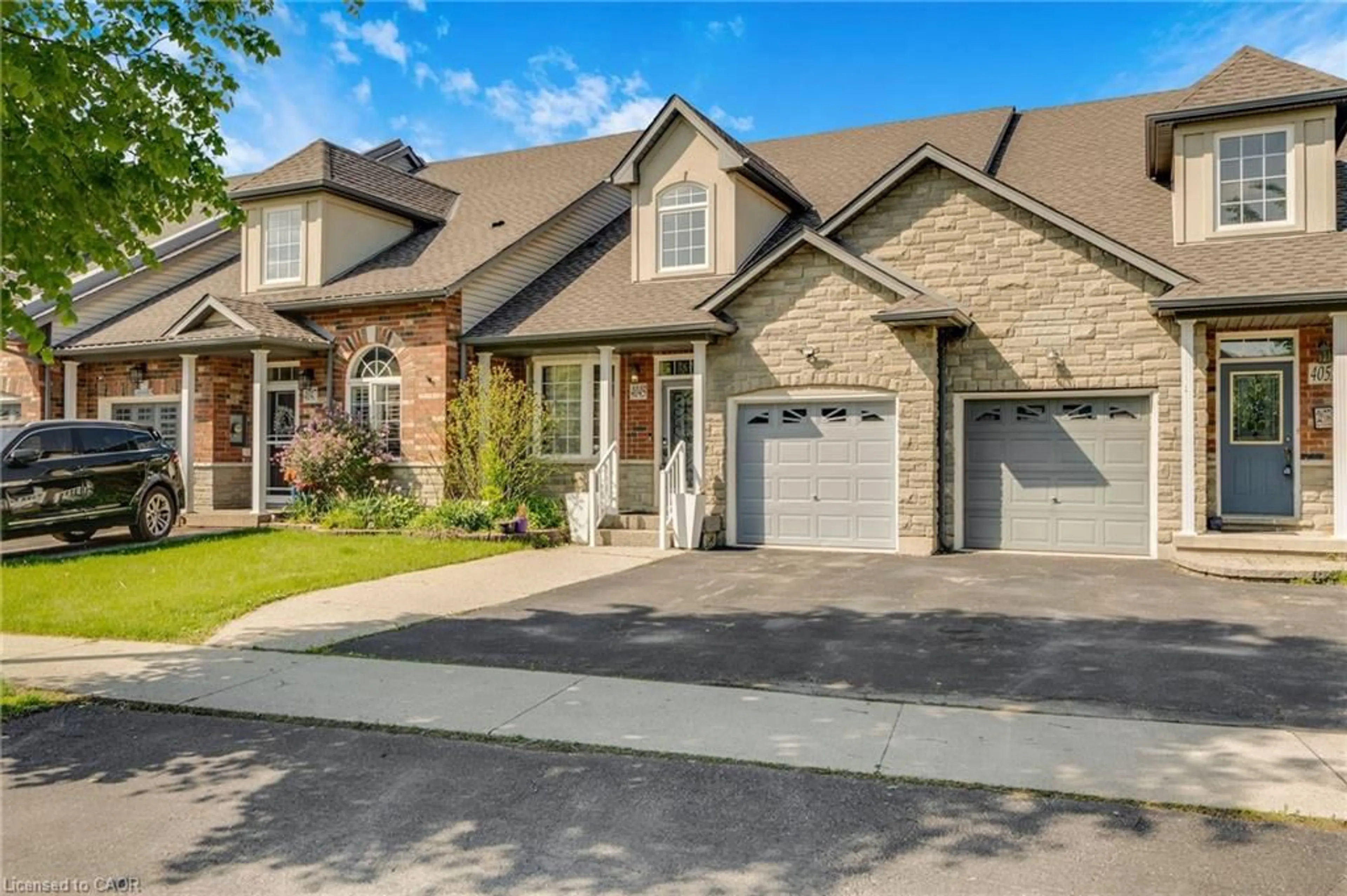 Home with brick exterior material, street for 4049 Medland Dr, Burlington Ontario L7M 4W7