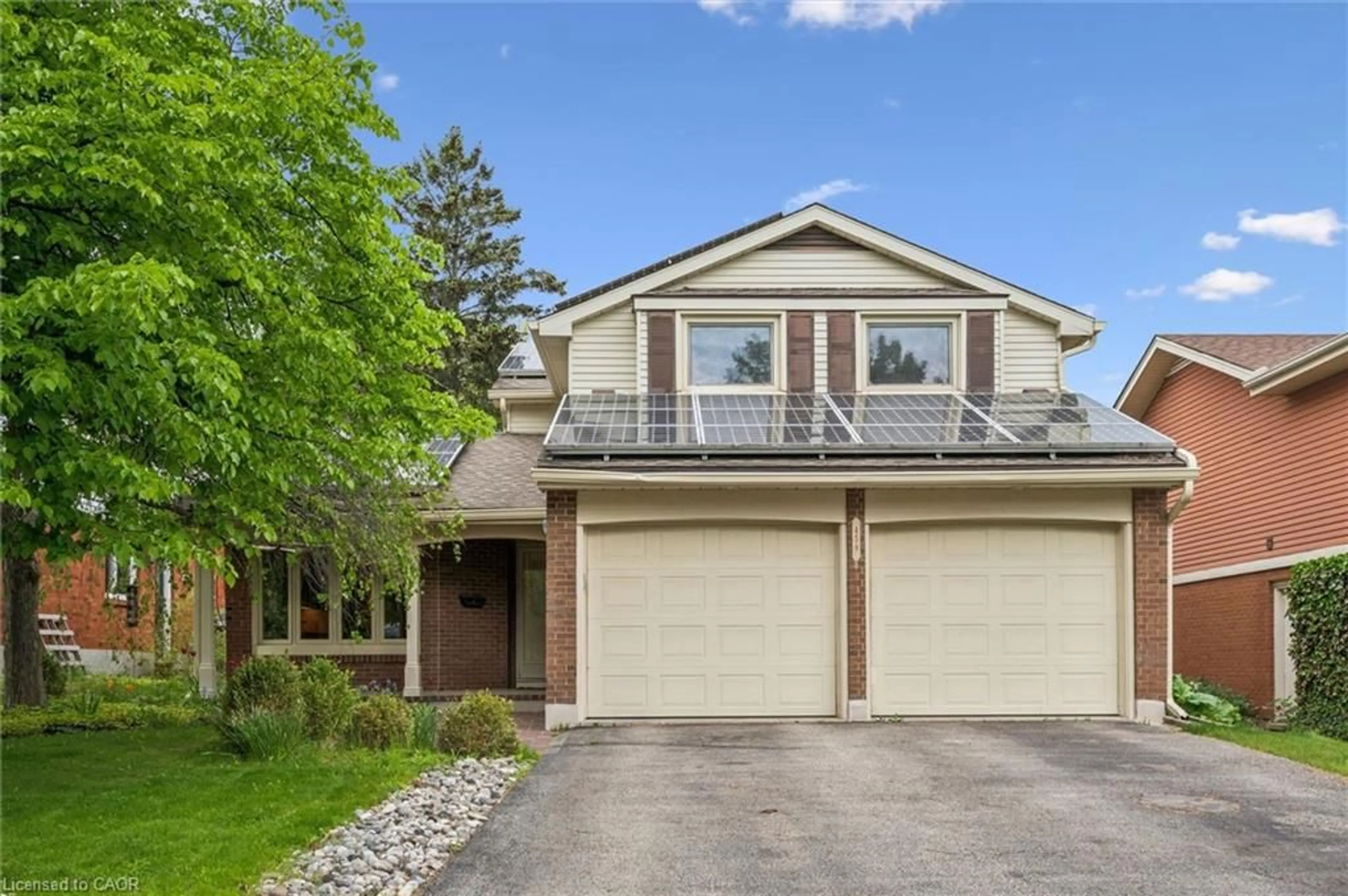 Home with brick exterior material, street for 459 Belgreen Way, Waterloo Ontario N2L 5X6
