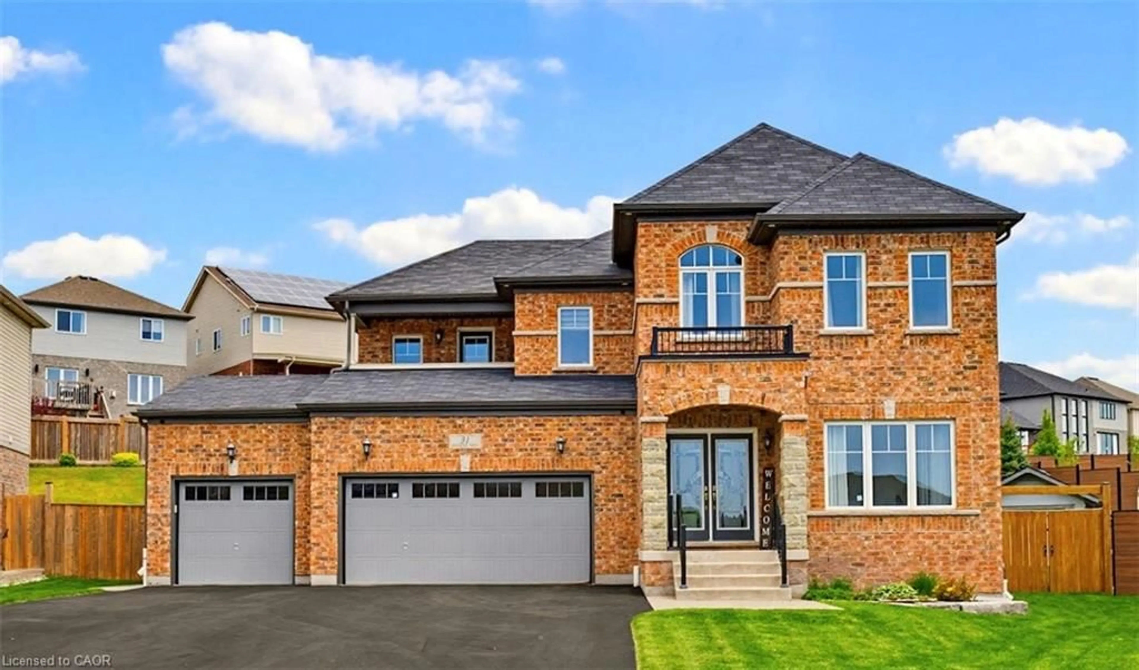 Home with brick exterior material, street for 31 Wetland Way, Kitchener Ontario N2P 0C2