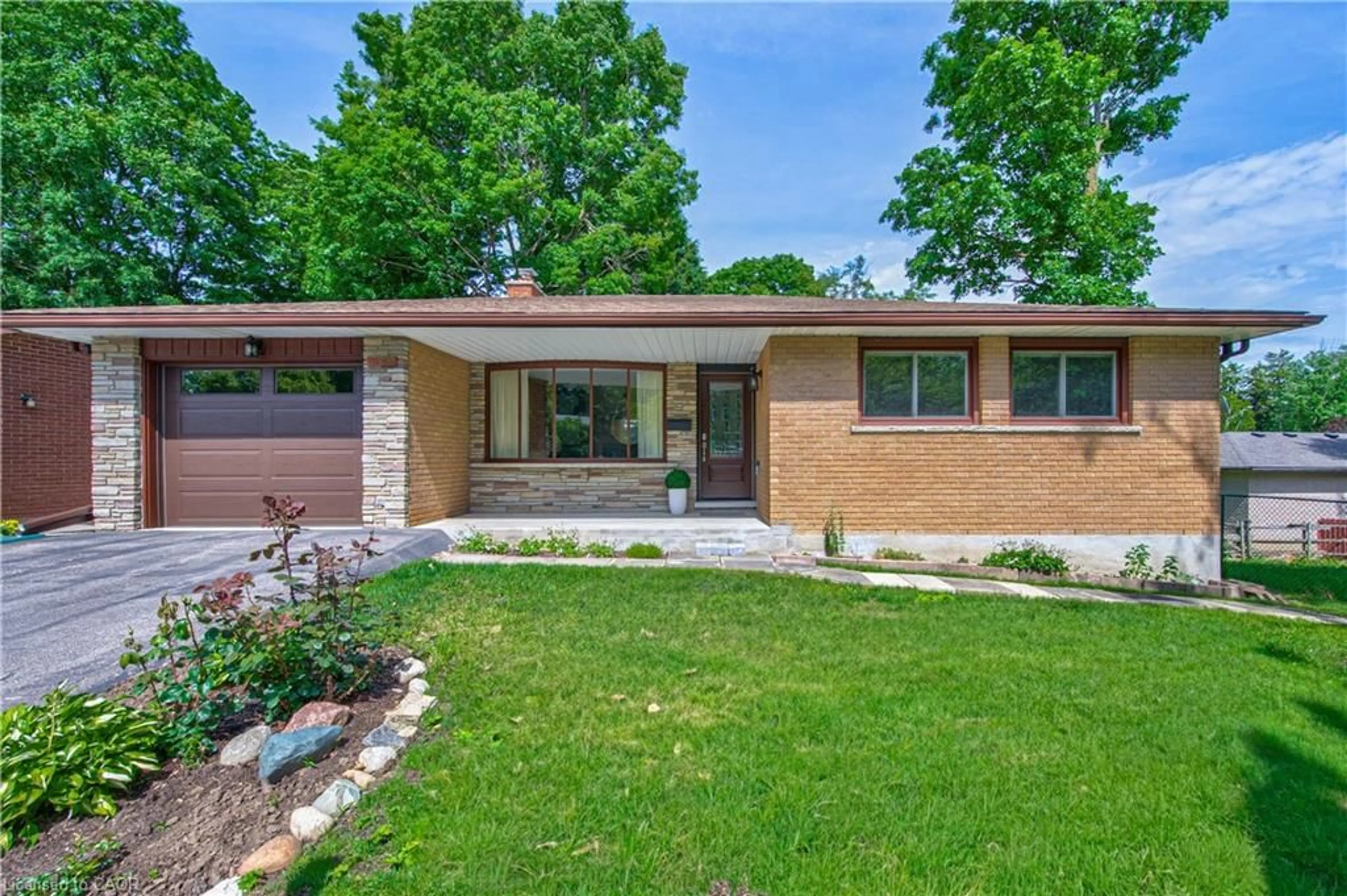 Home with brick exterior material, street for 598 Glen Forrest Blvd, Waterloo Ontario N2L 4J8