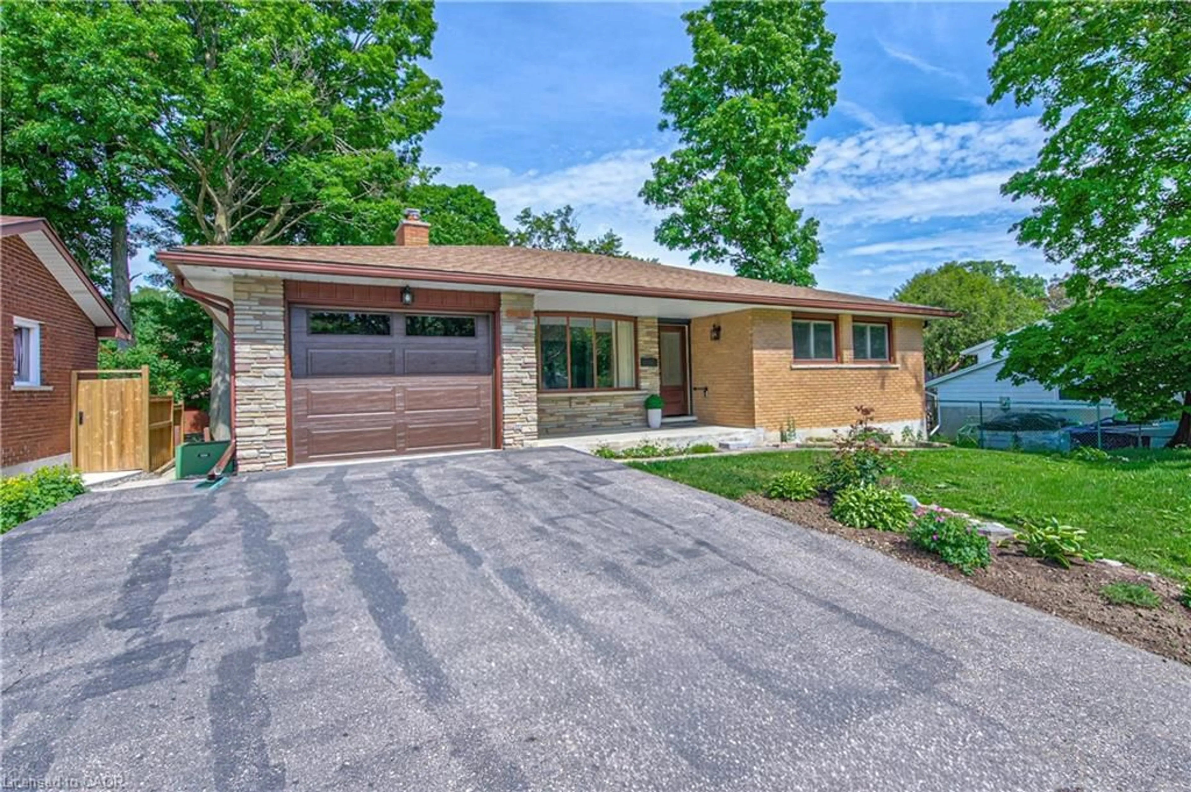 Home with brick exterior material, street for 598 Glen Forrest Blvd, Waterloo Ontario N2L 4J8