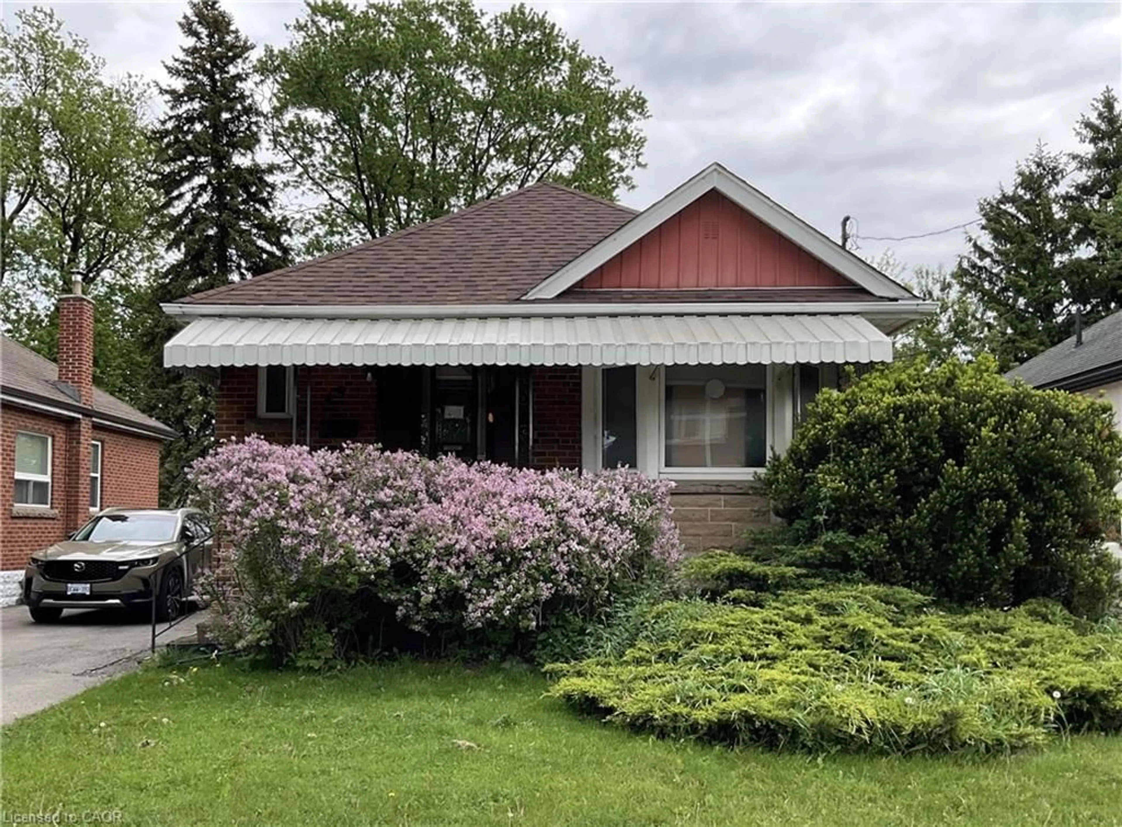 Home with vinyl exterior material, street for 49 West 3rd St, Hamilton Ontario L9C 3K1