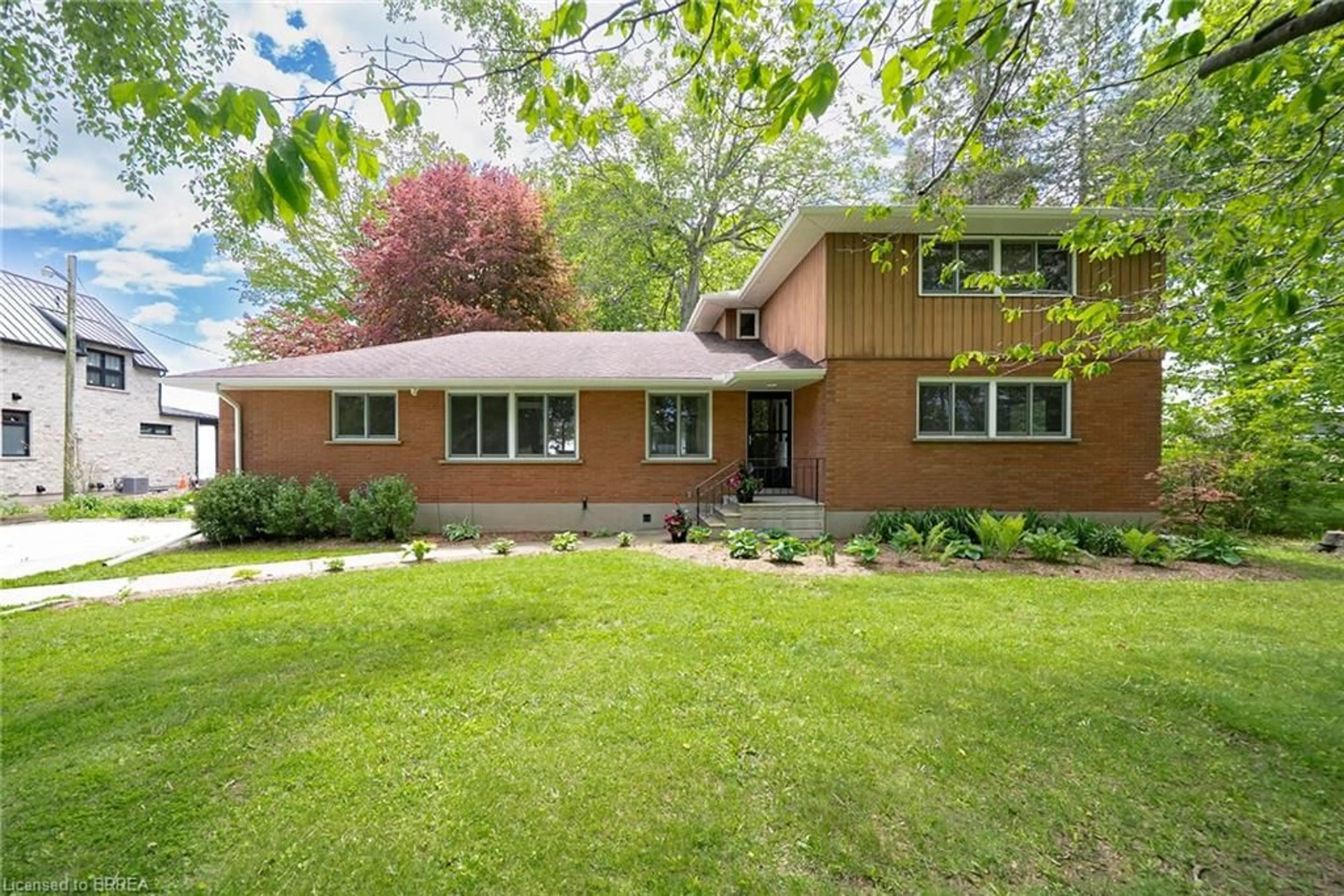Home with brick exterior material, street for 709 Nelson St, Port Dover Ontario N0A 1N2