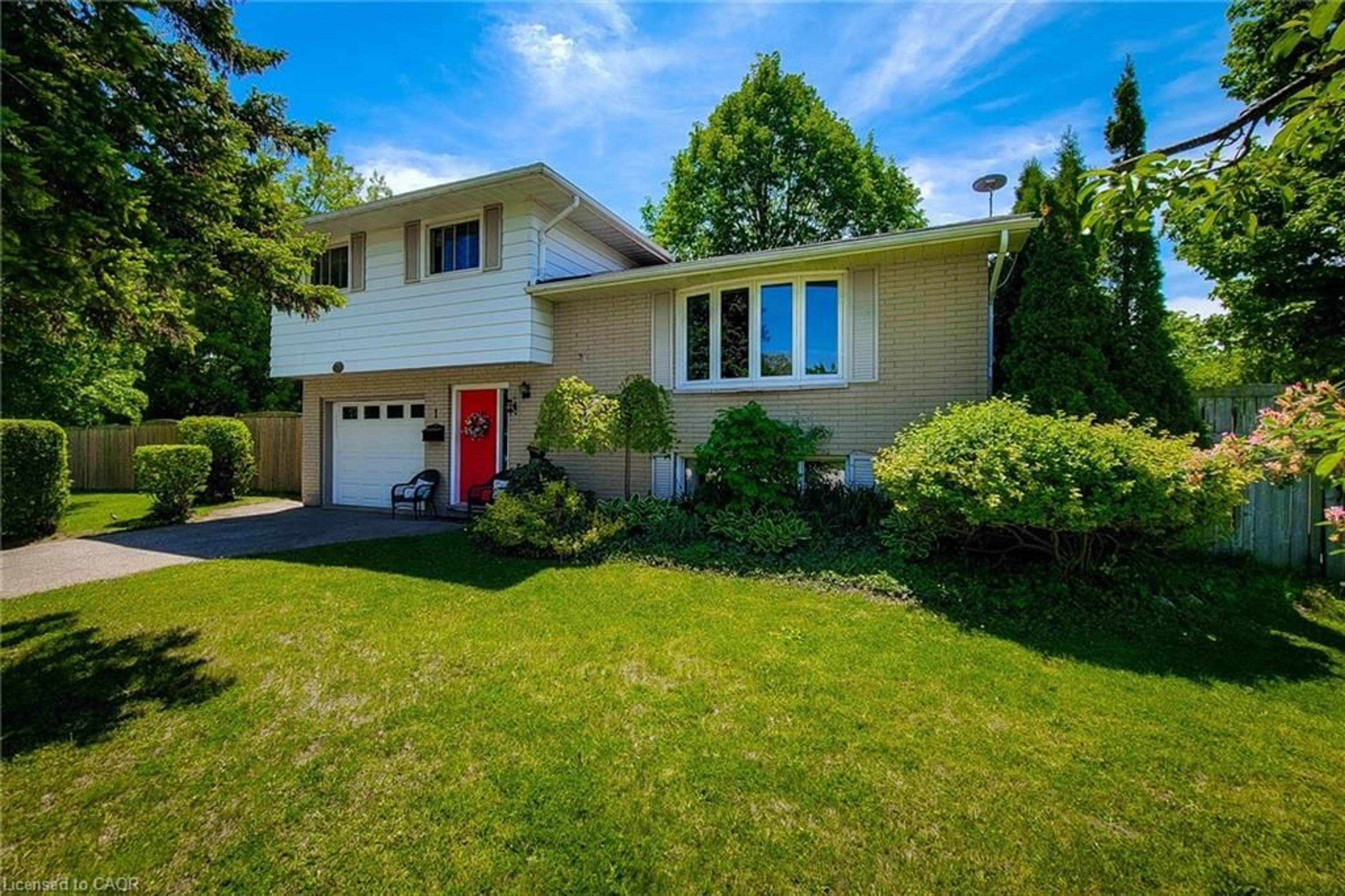 Home with vinyl exterior material, street for 1 Greenwood Ave, Cambridge Ontario N1R 2Y2