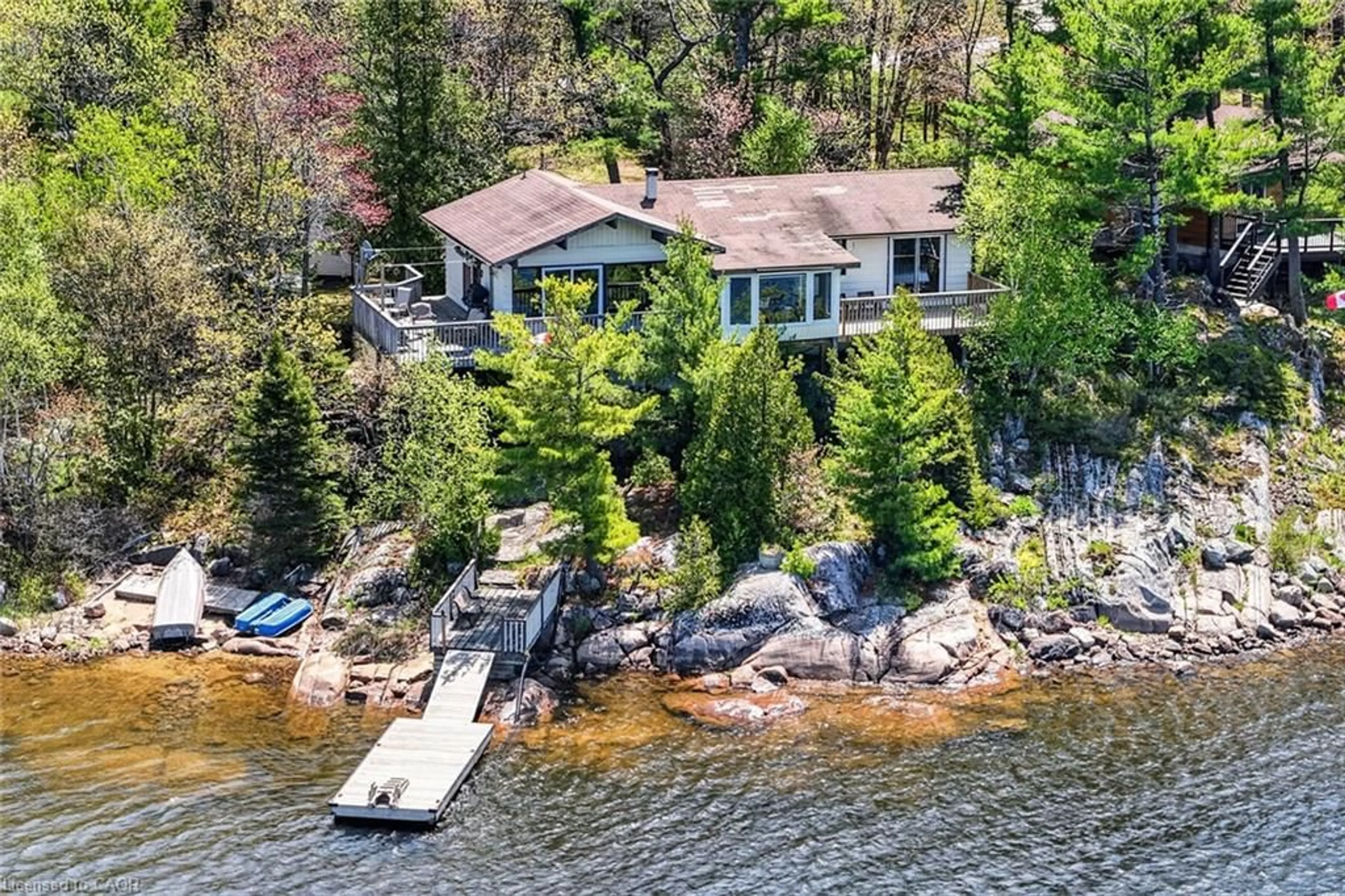 A pic from outside/outdoor area/front of a property/back of a property/a pic from drone, water/lake/river/ocean view for 29 Ginn-Beach Dr, The Archipelago Ontario P0G 1G0