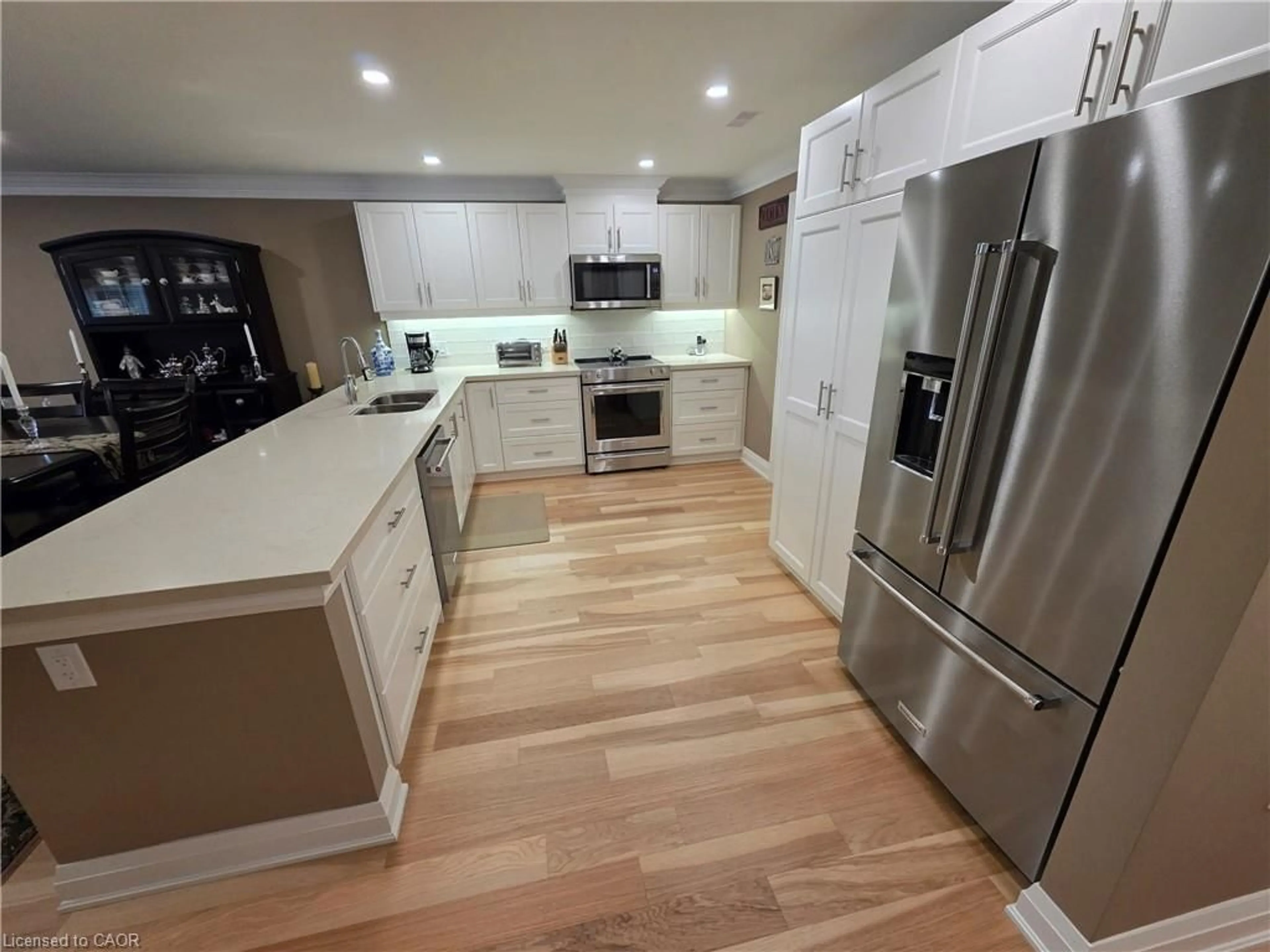 Open concept kitchen, unknown for 10 Archdeacon Clark Trail, Hamilton Ontario L9B 2M2