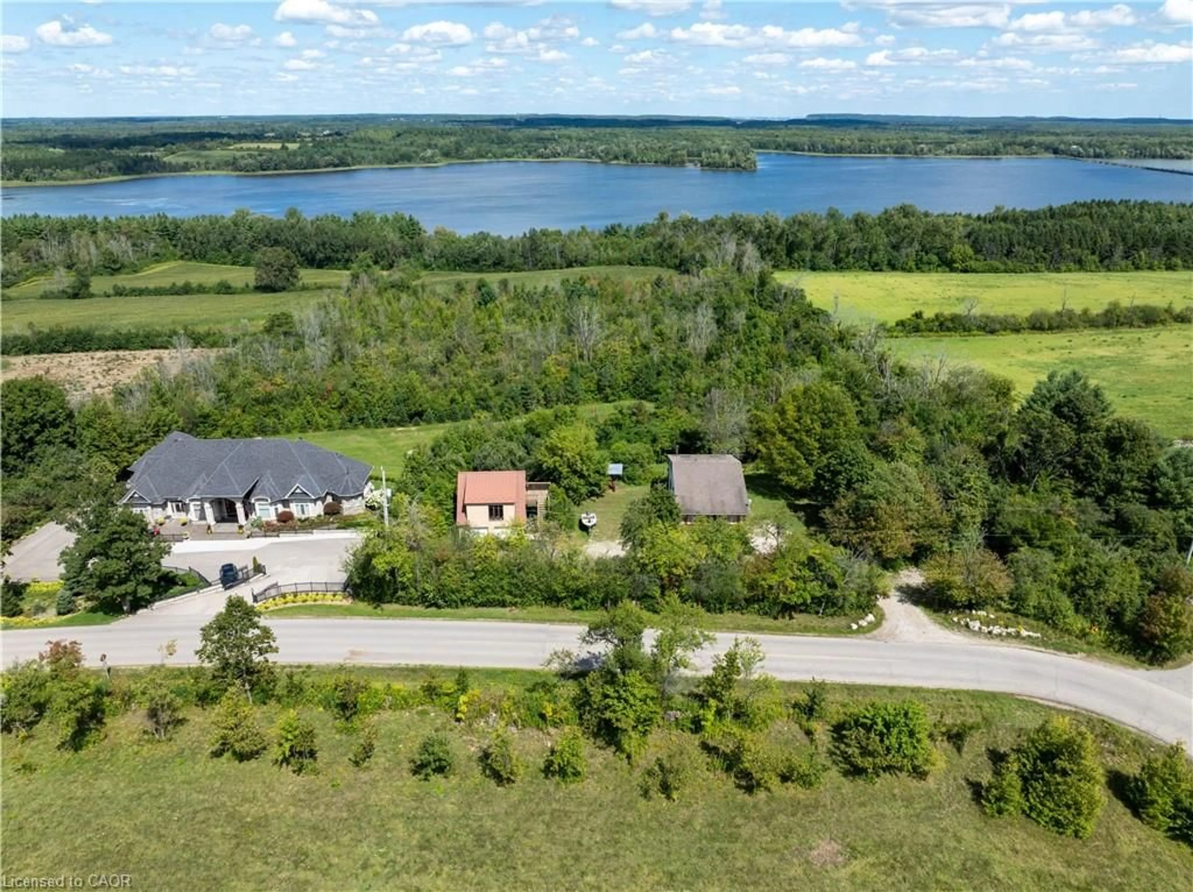 A pic from outside/outdoor area/front of a property/back of a property/a pic from drone, water/lake/river/ocean view for 4053 Watson Rd, Puslinch Ontario N0B 2J0