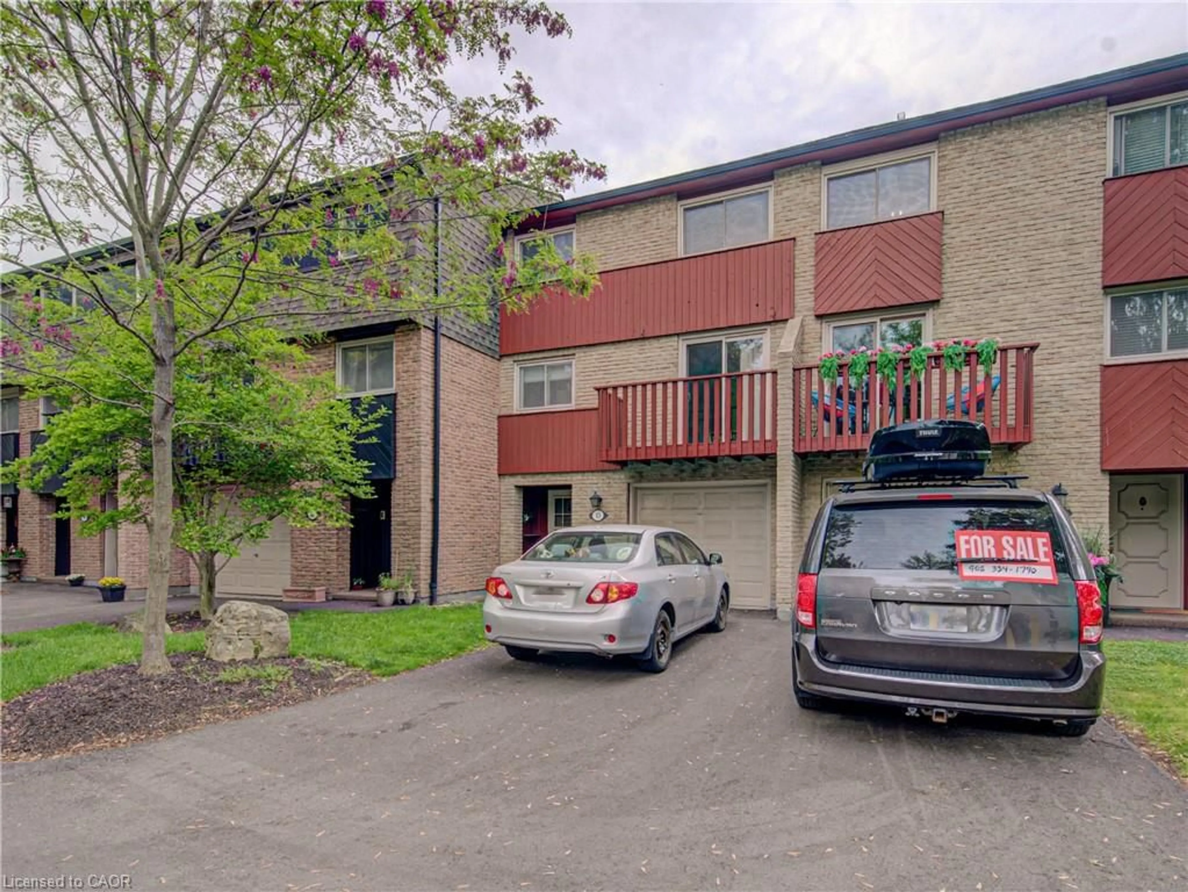 A pic from outside/outdoor area/front of a property/back of a property/a pic from drone, street for 1967 Main St #13, Hamilton Ontario L8S 4P4