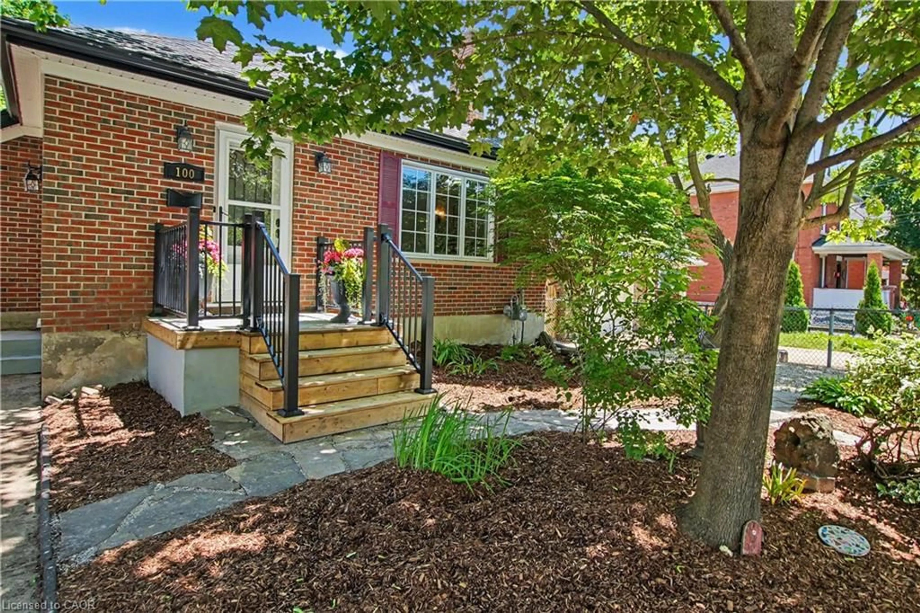 Home with brick exterior material, street for 100 Johnston St, Guelph Ontario N1E 5T8