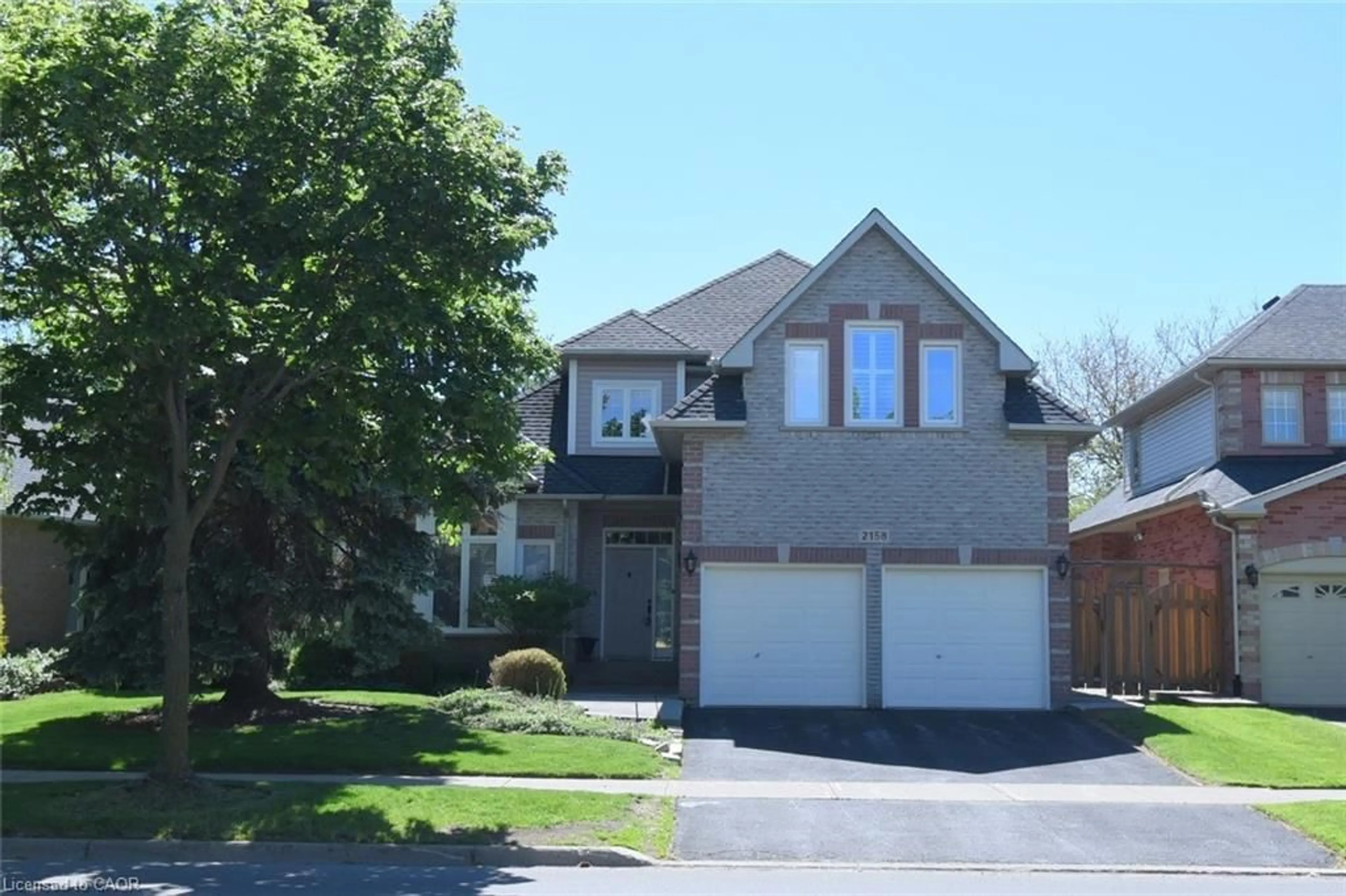 Home with brick exterior material, street for 2158 Country Club Dr, Burlington Ontario L7M 4B1