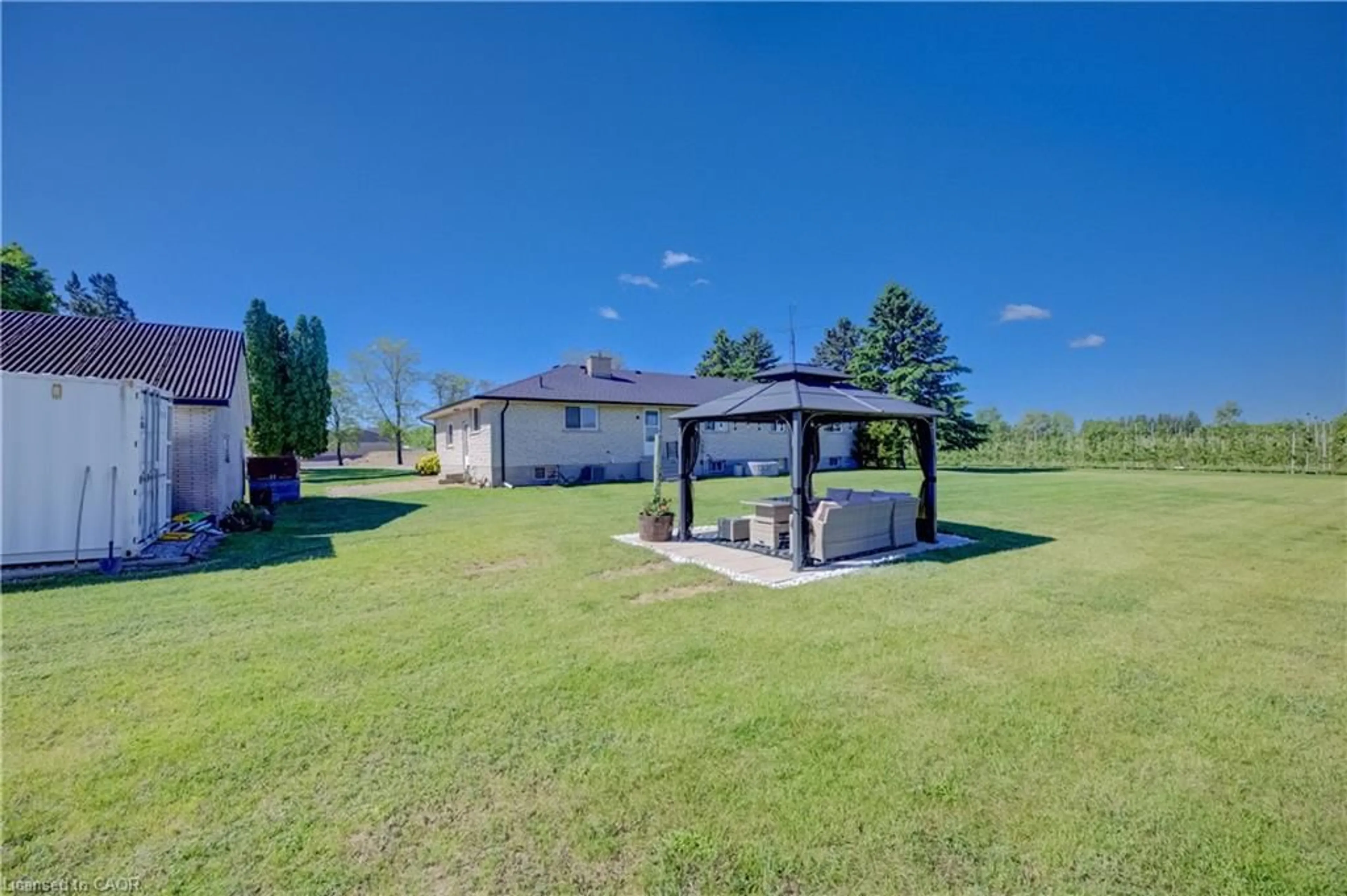 A pic from outside/outdoor area/front of a property/back of a property/a pic from drone, water/lake/river/ocean view for 225863 Otterville Rd, Otterville Ontario N0J 1R0