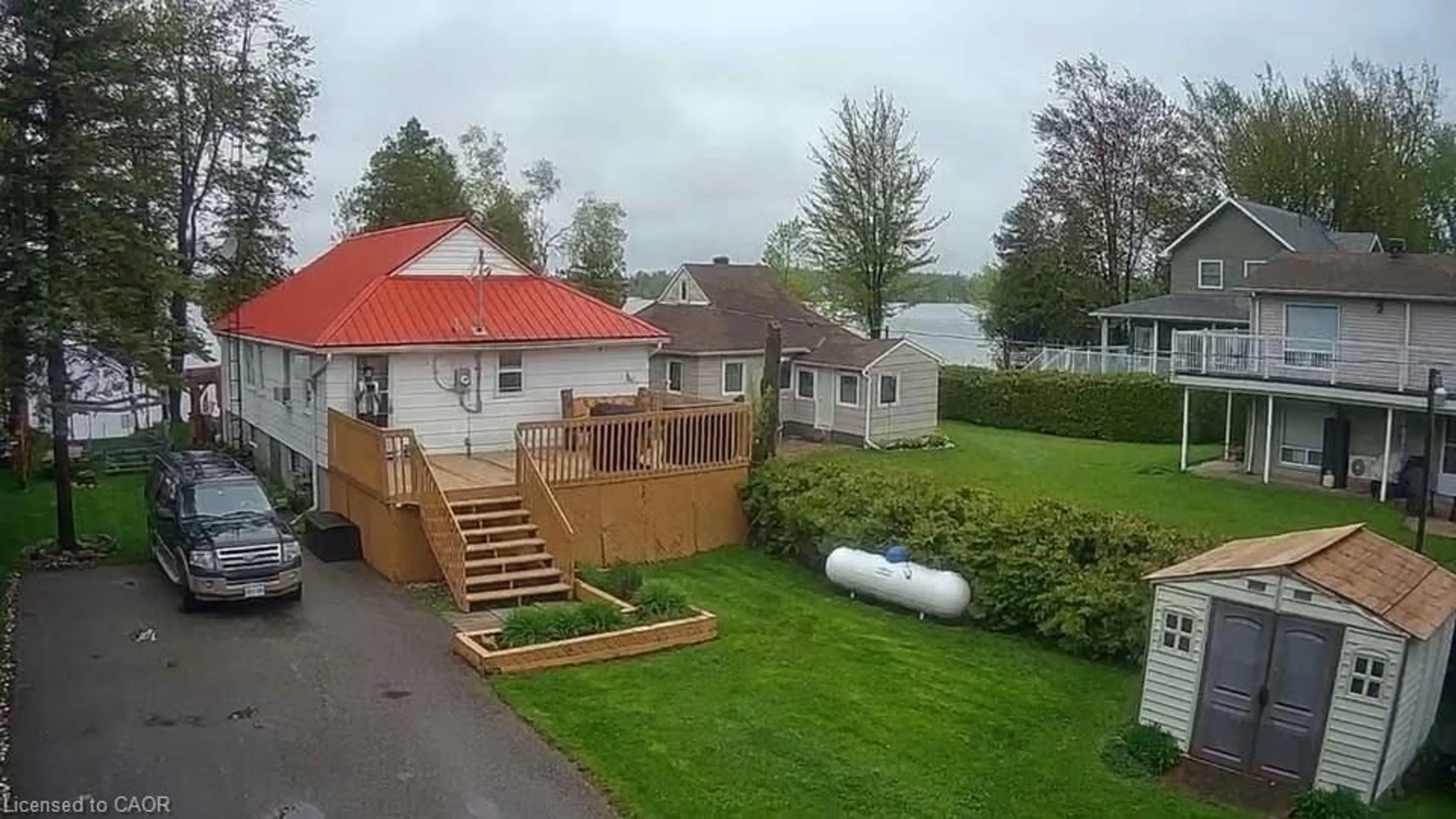 A pic from outside/outdoor area/front of a property/back of a property/a pic from drone, water/lake/river/ocean view for 4250 Plum Point Rd, Ramara Ontario L3V 0P8