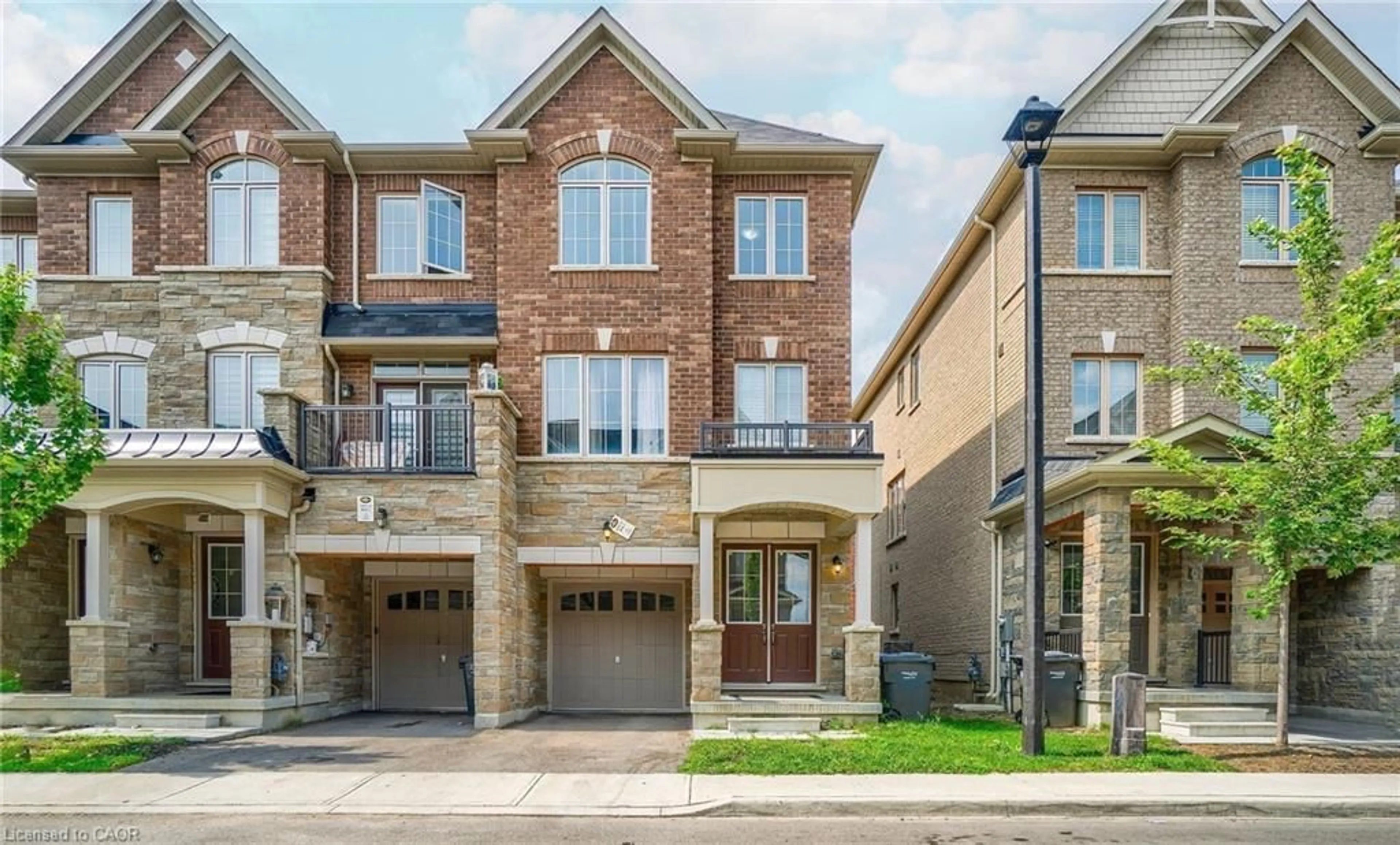 Home with brick exterior material, street for 14 Faye St, Brampton Ontario L6P 4M9