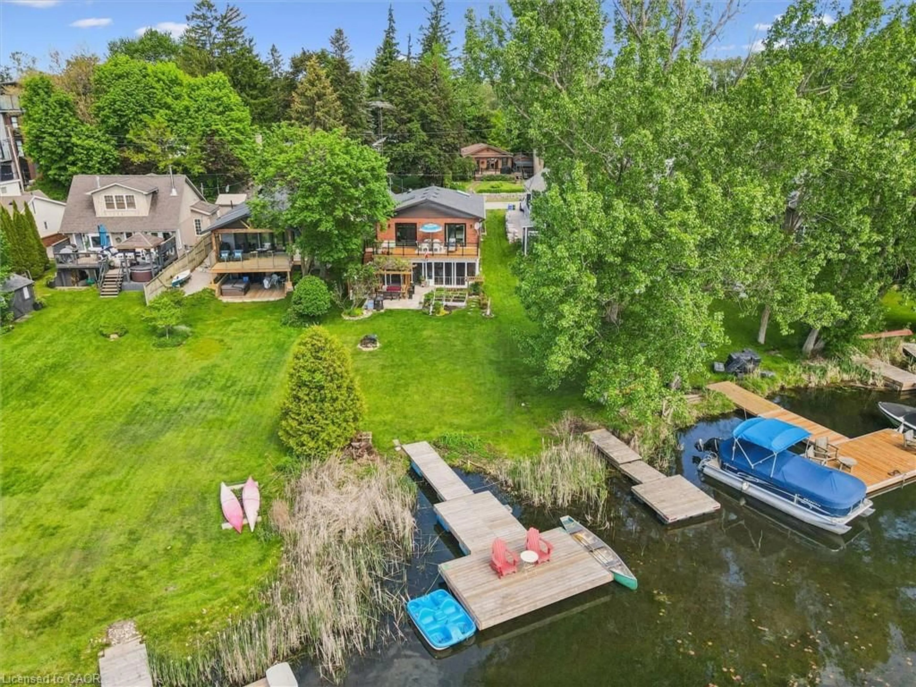 A pic from outside/outdoor area/front of a property/back of a property/a pic from drone, water/lake/river/ocean view for 39 Holly Trail, Puslinch Ontario N3C 2V4