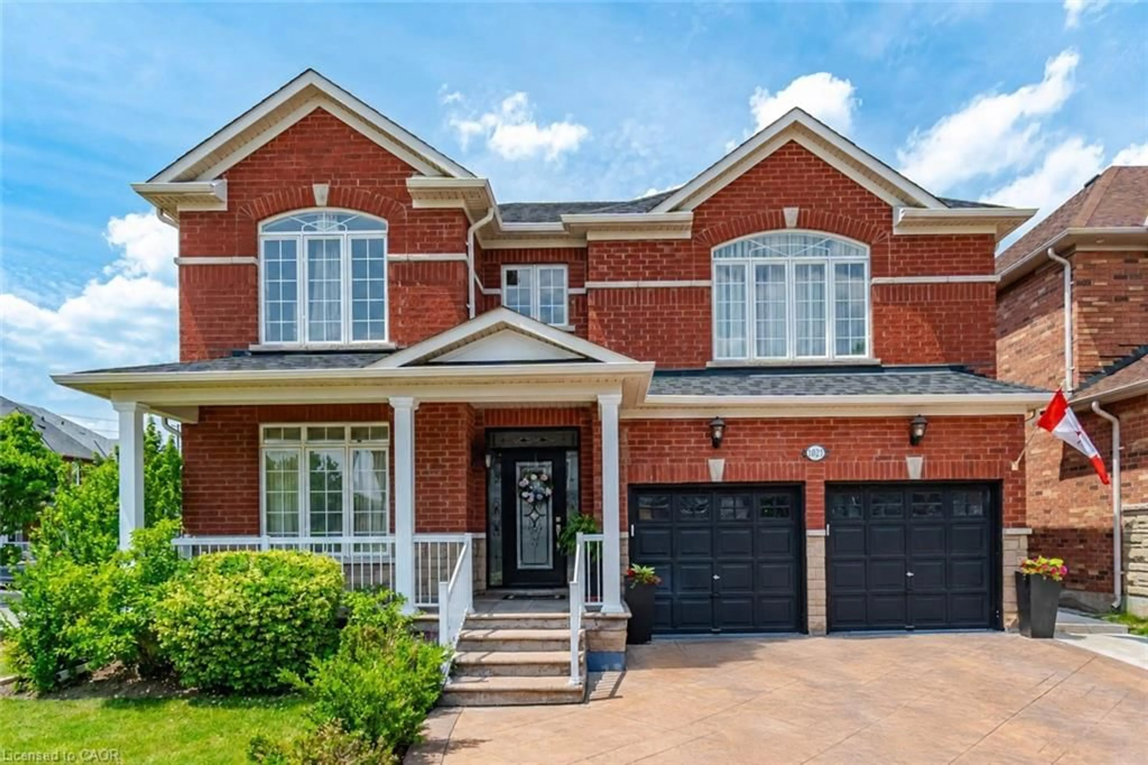 Home with brick exterior material, street for 1021 Hemstreet Cres, Milton Ontario L9T 6S2