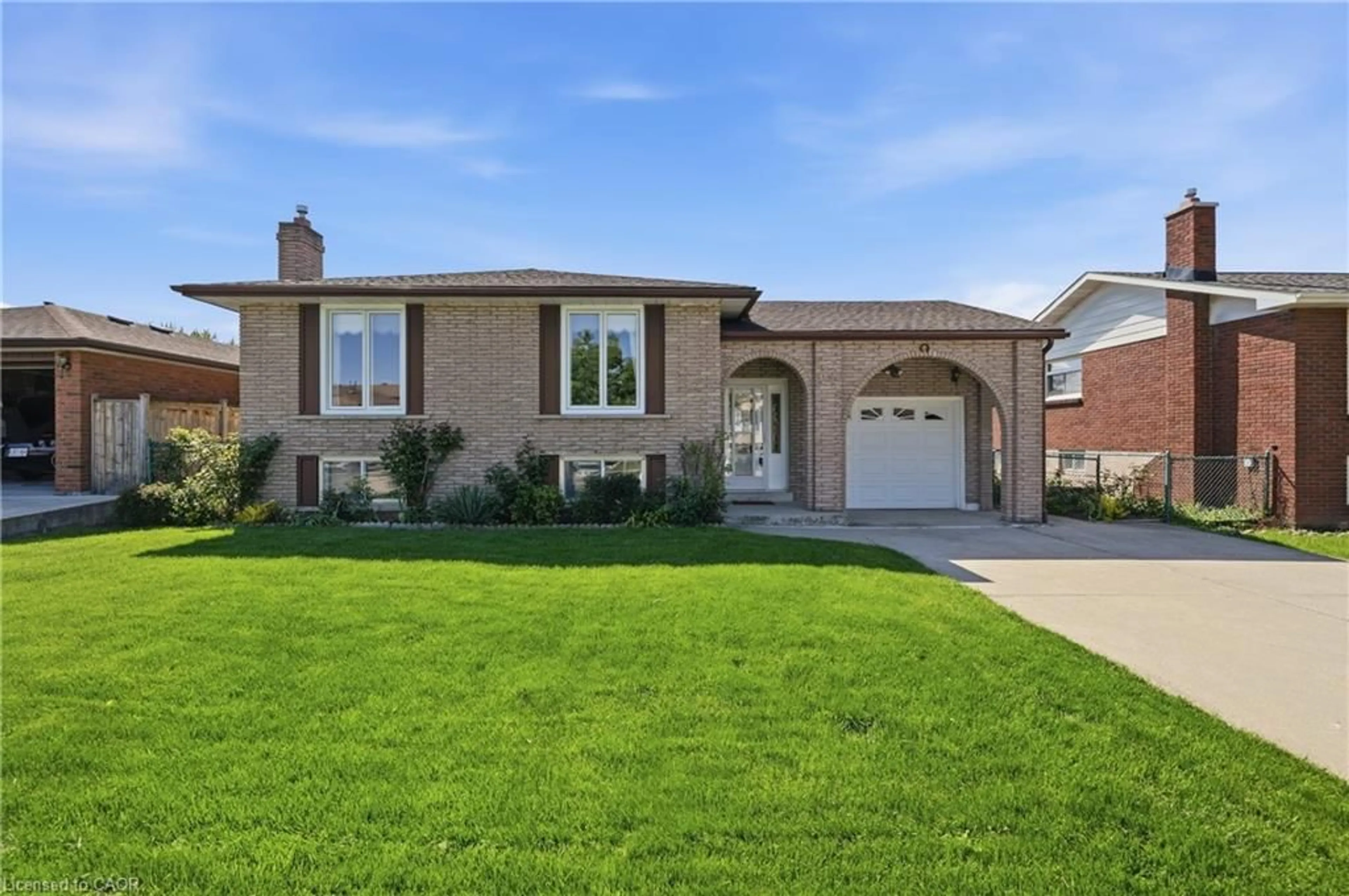 Home with brick exterior material, street for 64 Eastbury Dr, Stoney Creek Ontario L8E 2V4