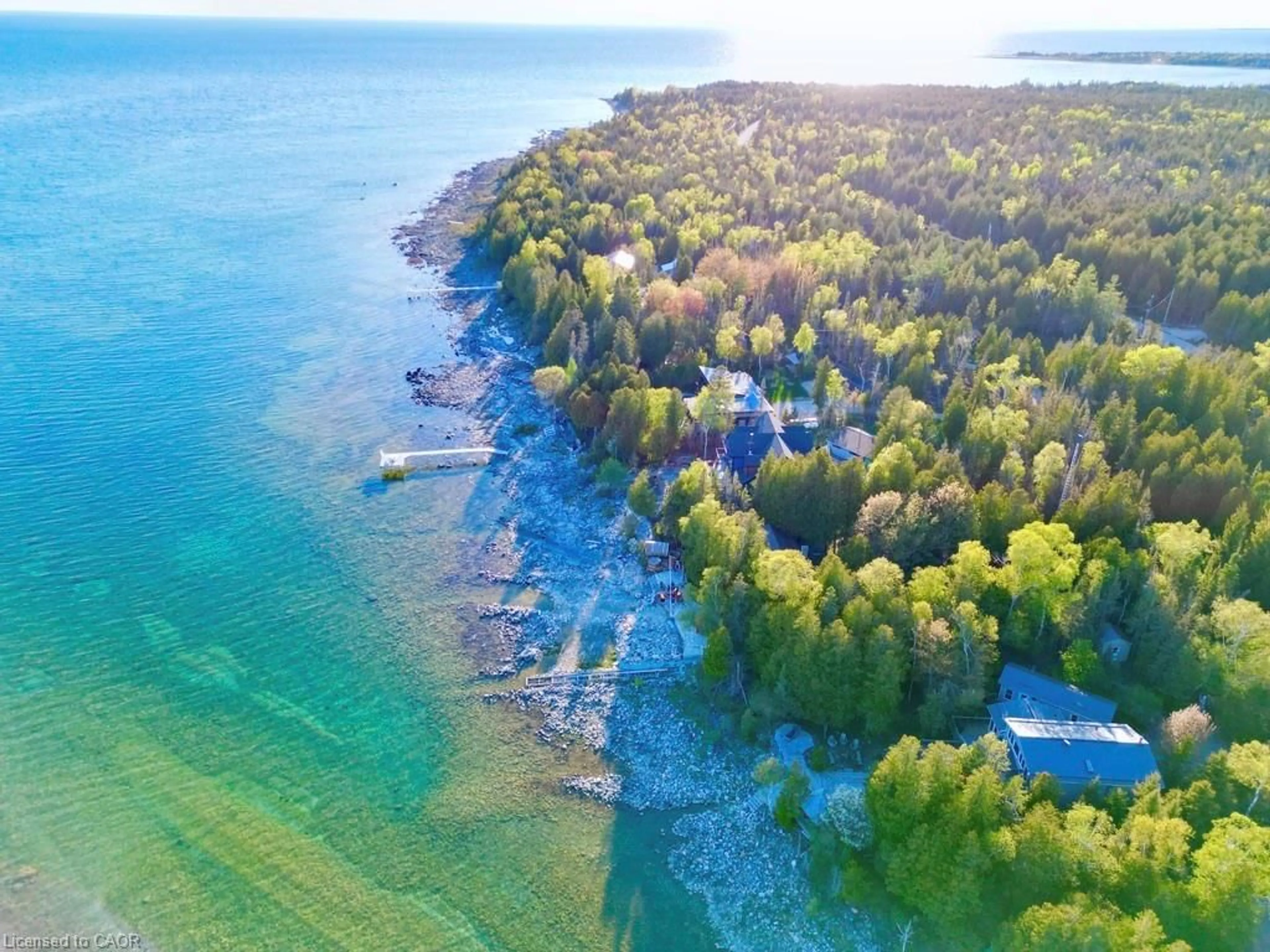 A pic from outside/outdoor area/front of a property/back of a property/a pic from drone, water/lake/river/ocean view for 1166 Dorcas Bay Rd, Tobermory Ontario N0H 2R0