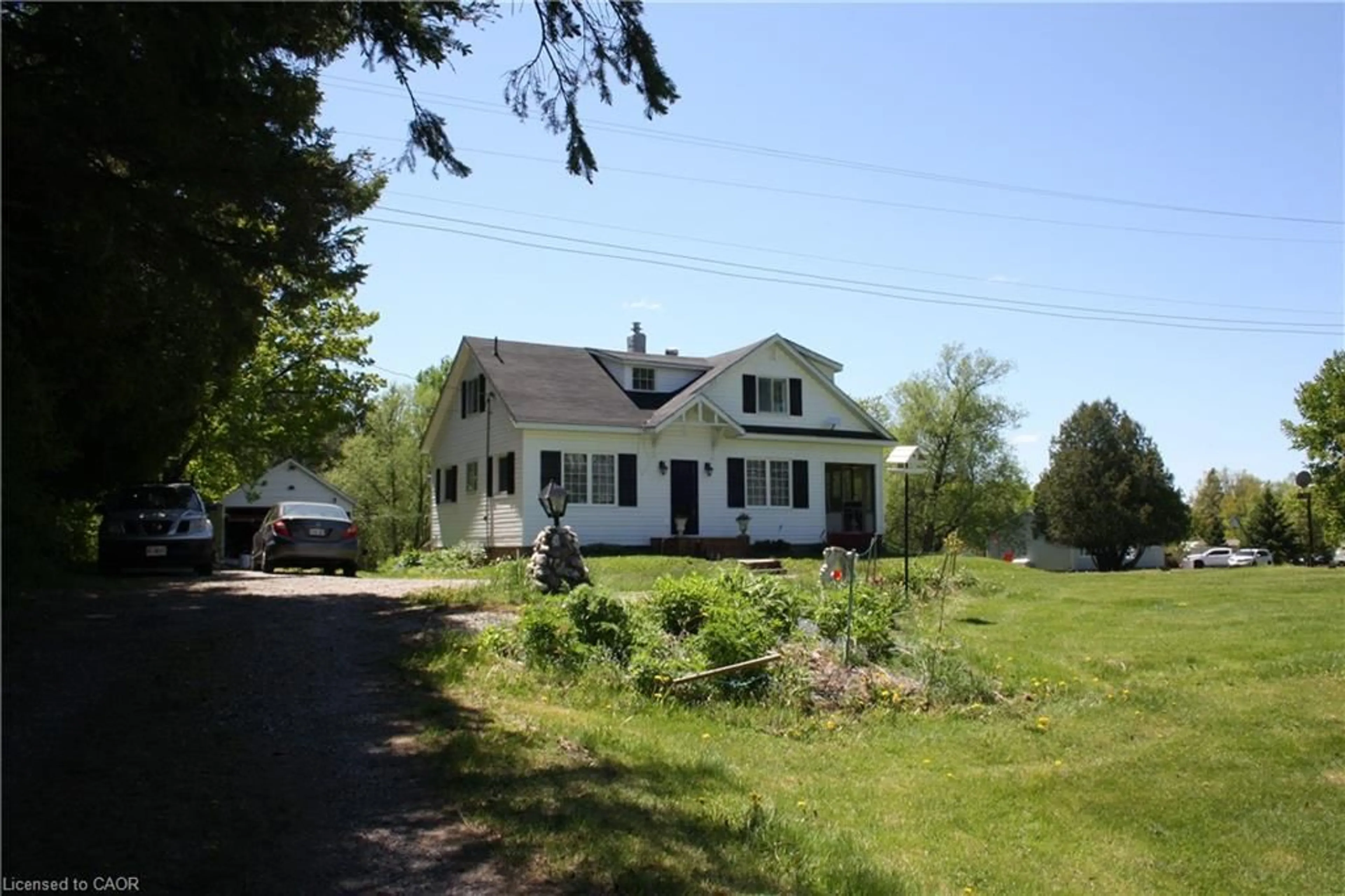 A pic from outside/outdoor area/front of a property/back of a property/a pic from drone, unknown for 11519 522 Hwy, Parry Sound Ontario P0H 1Y0