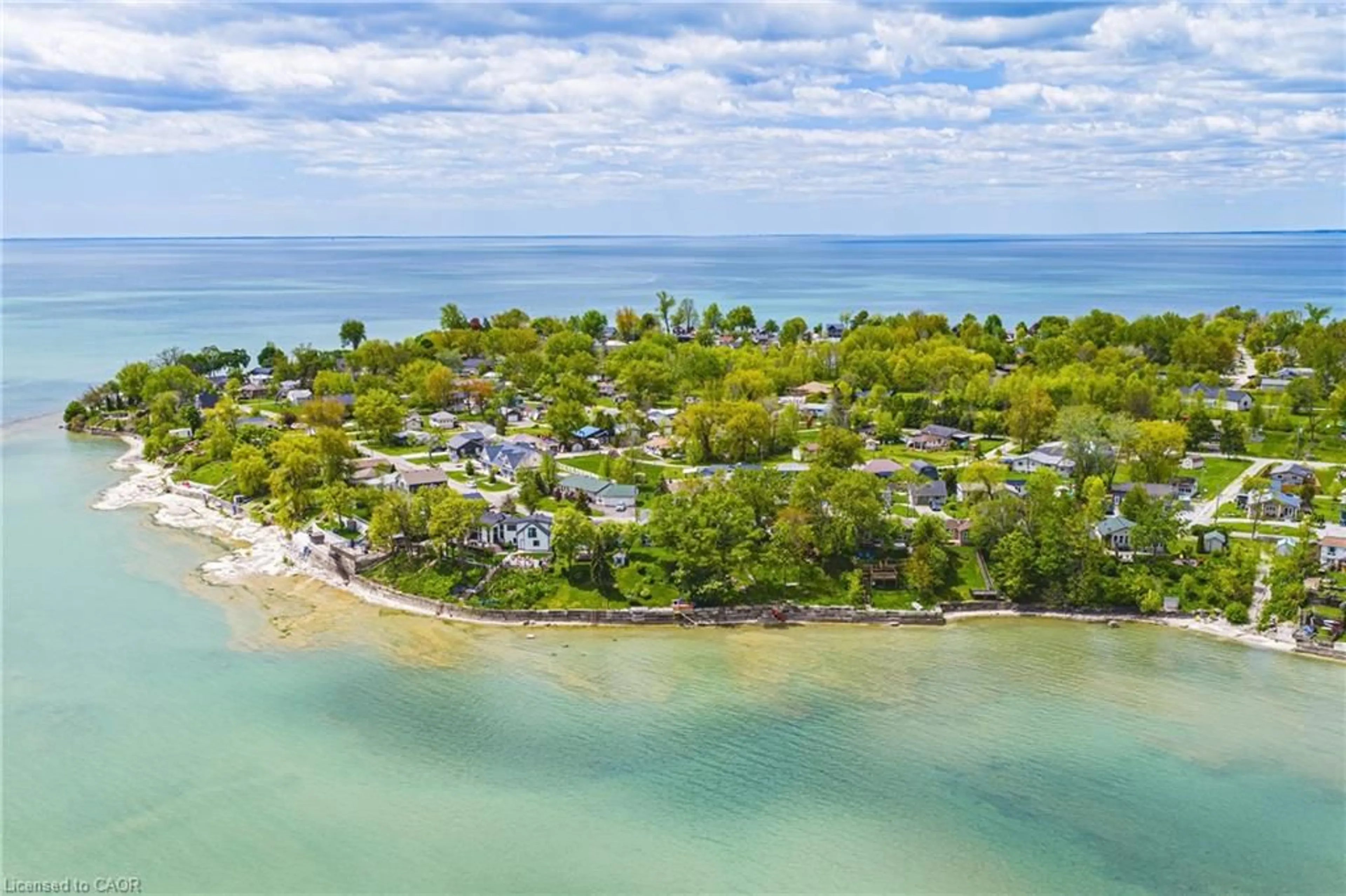 A pic from outside/outdoor area/front of a property/back of a property/a pic from drone, water/lake/river/ocean view for 52 Wilcox Dr, Peacock Point Ontario N0A 1L0