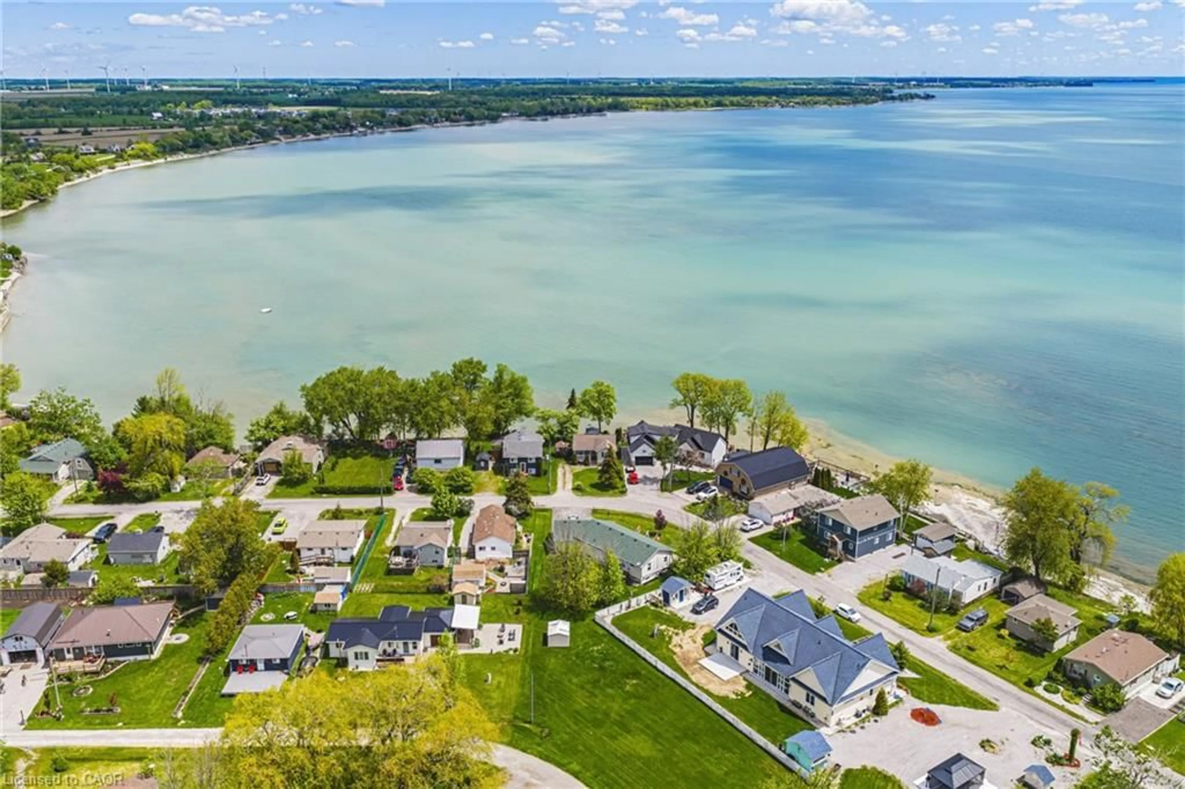 A pic from outside/outdoor area/front of a property/back of a property/a pic from drone, water/lake/river/ocean view for 52 Wilcox Dr, Peacock Point Ontario N0A 1L0