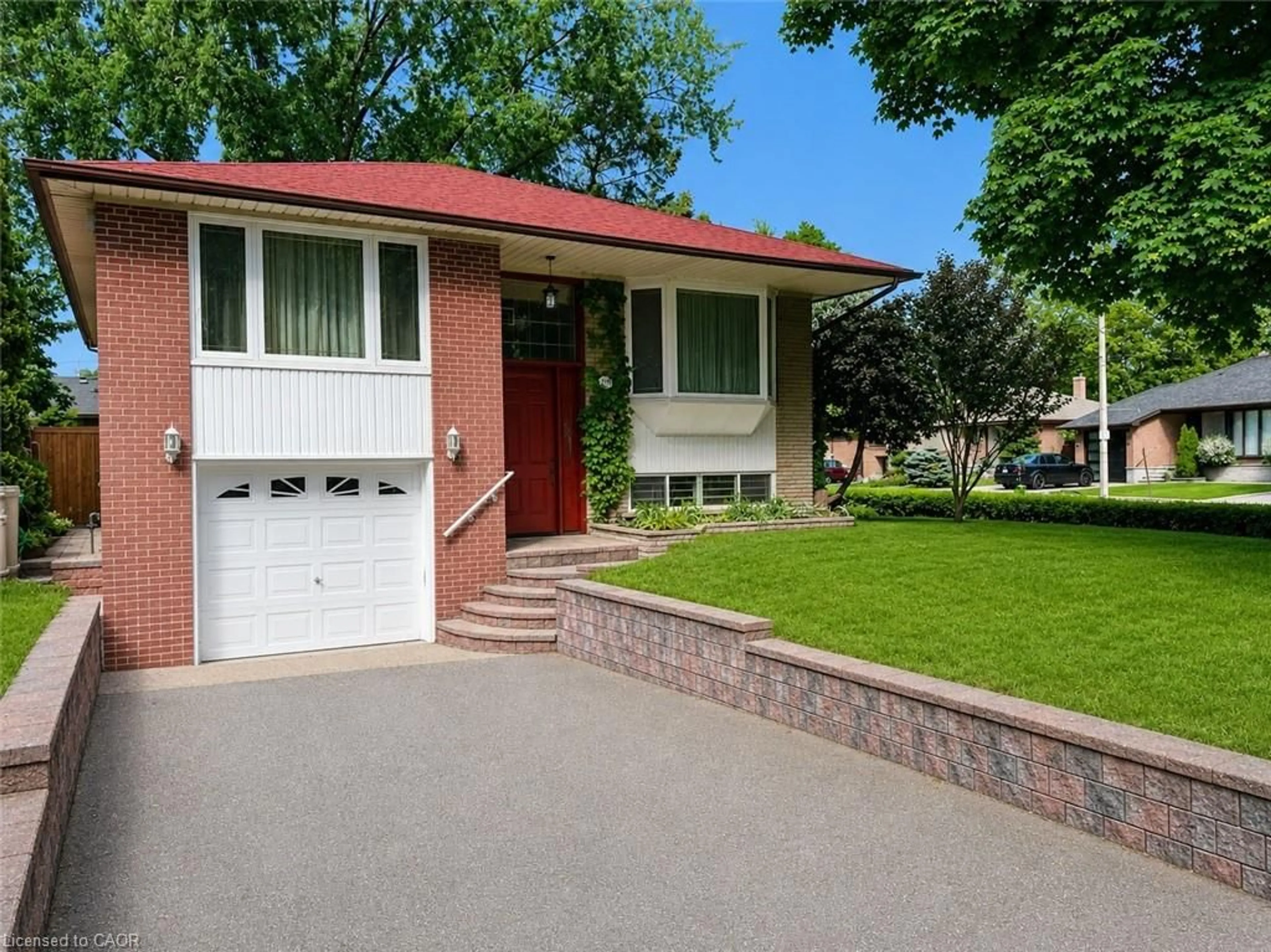 Home with brick exterior material, street for 1571 Muir Rd, Mississauga Ontario L5E 2J3