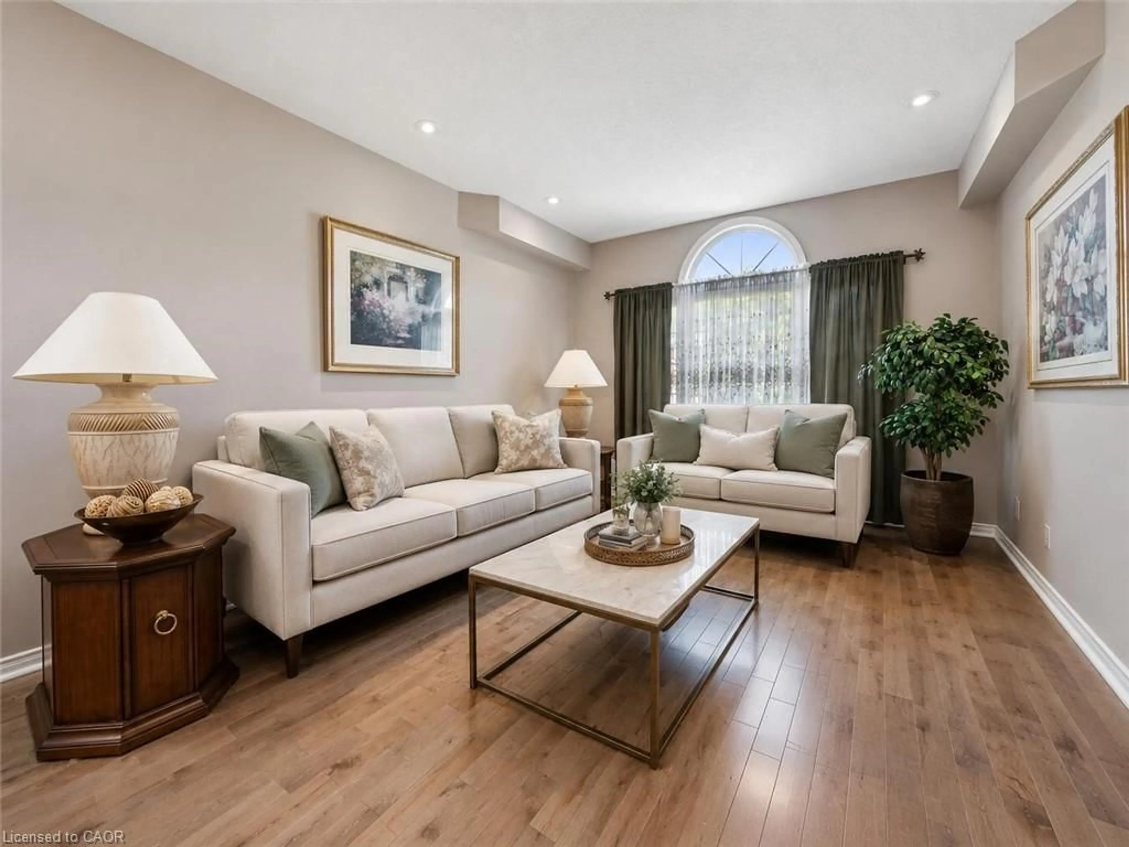 Living room with furniture, wood/laminate floor for 24 Pine Ridge Dr, Guelph Ontario N1L 1K3