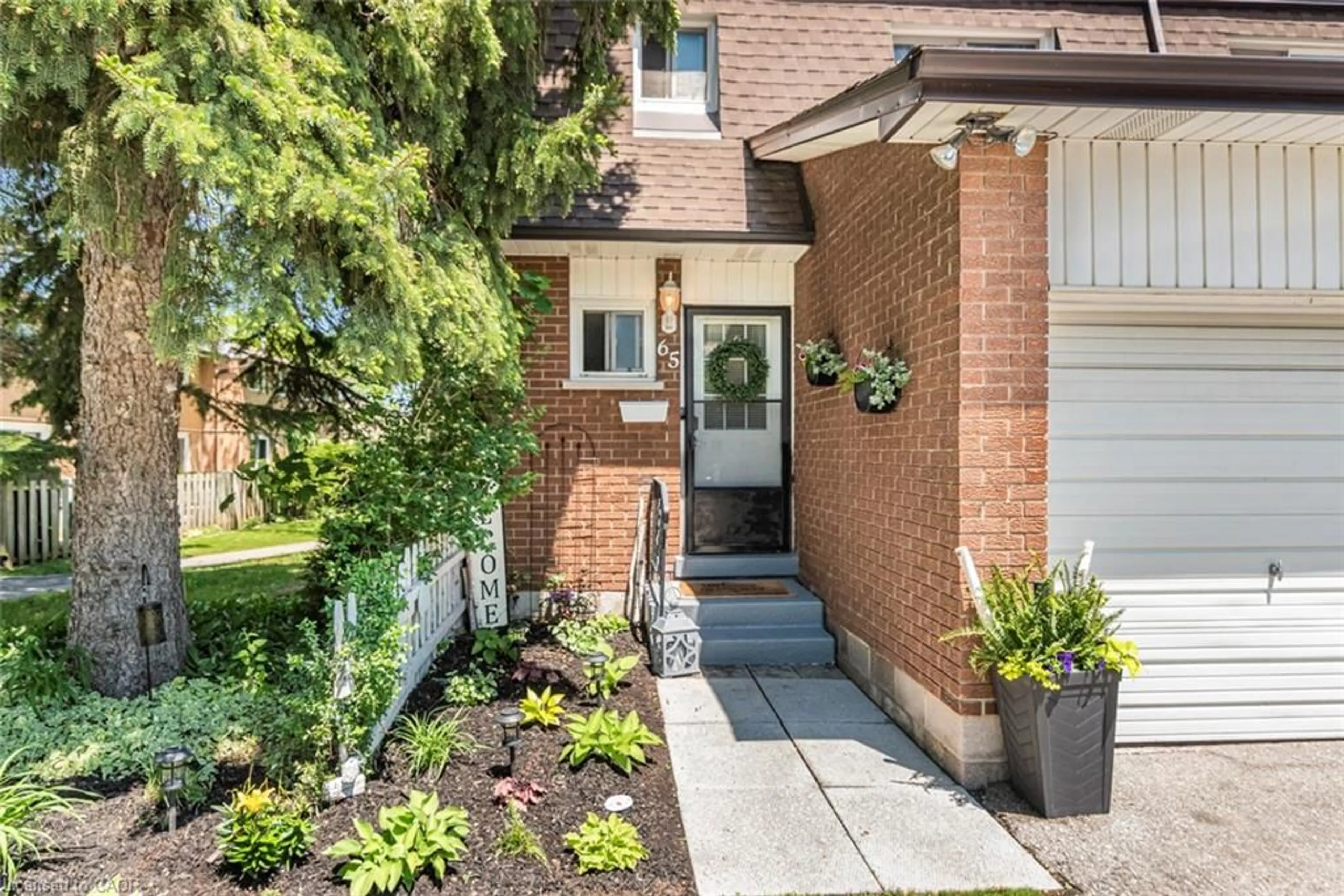 Home with brick exterior material, street for 1440 Garth St #65, Hamilton Ontario L9B 1R6