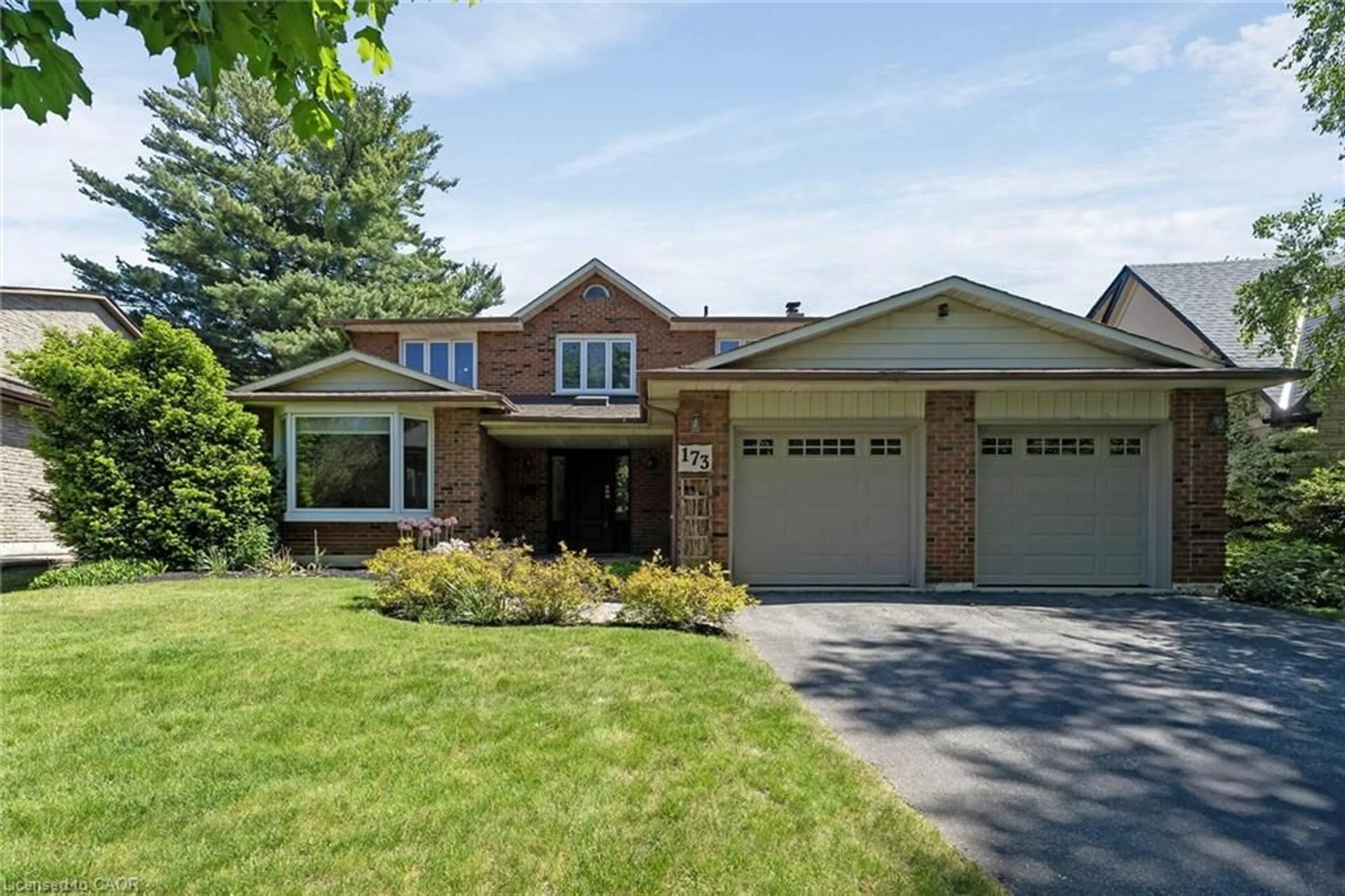 Home with brick exterior material, street for 173 All Saints Cres, Oakville Ontario L6J 5Y6