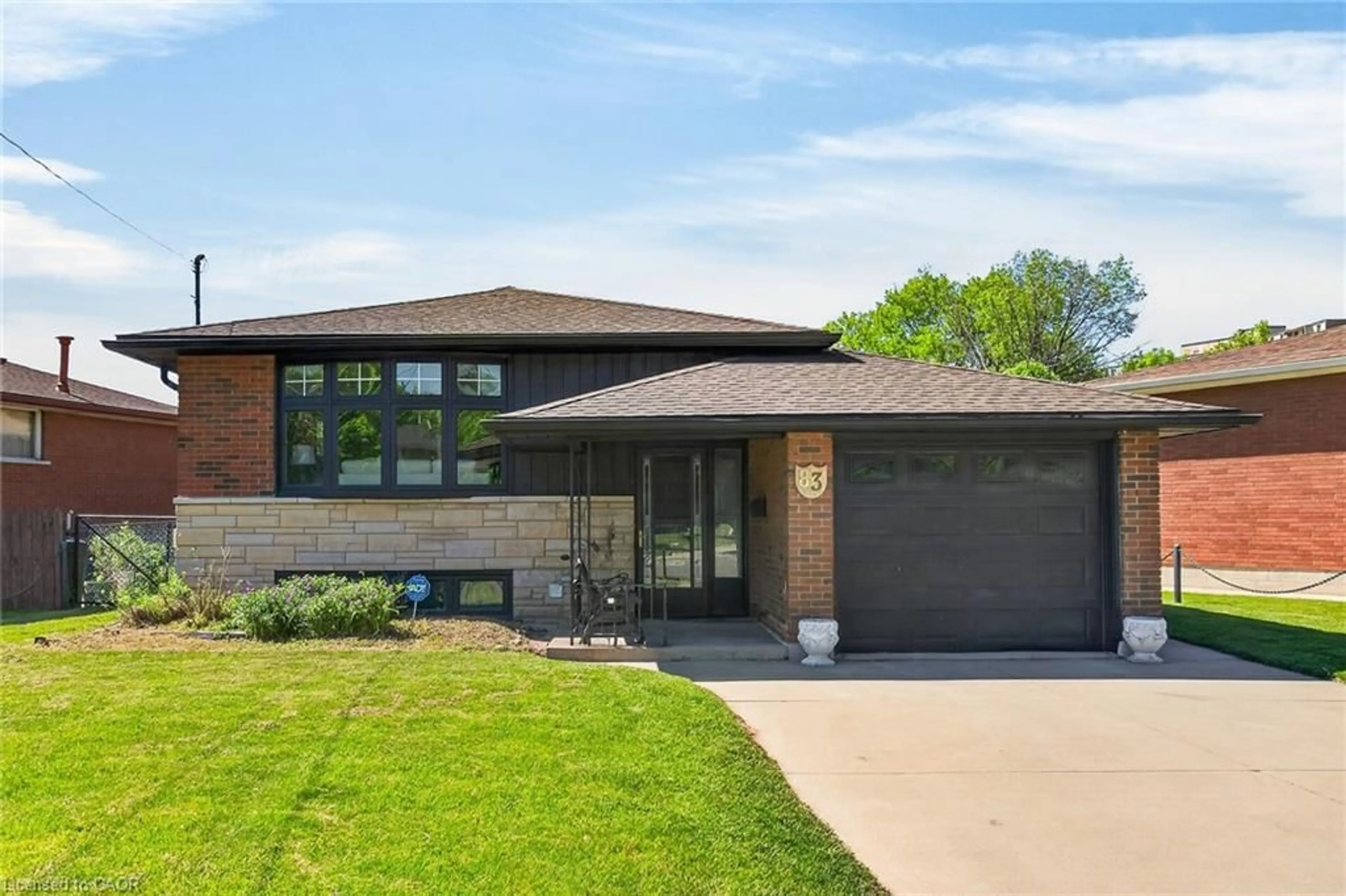 Home with brick exterior material, street for 83 Riverdale Dr, Hamilton Ontario L8E 1K2