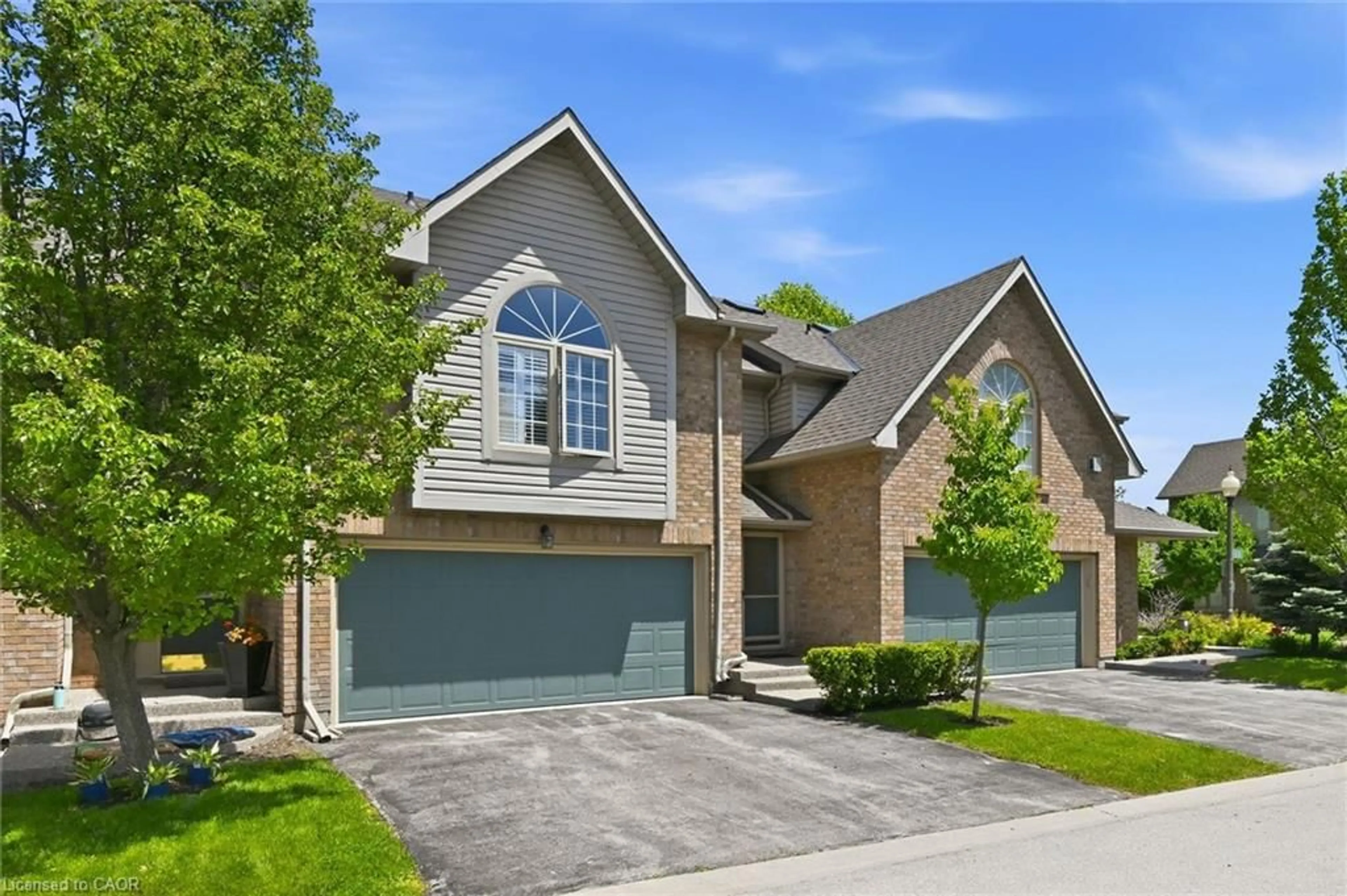 Home with brick exterior material, street for 3333 New St #19, Burlington Ontario L7N 1N1