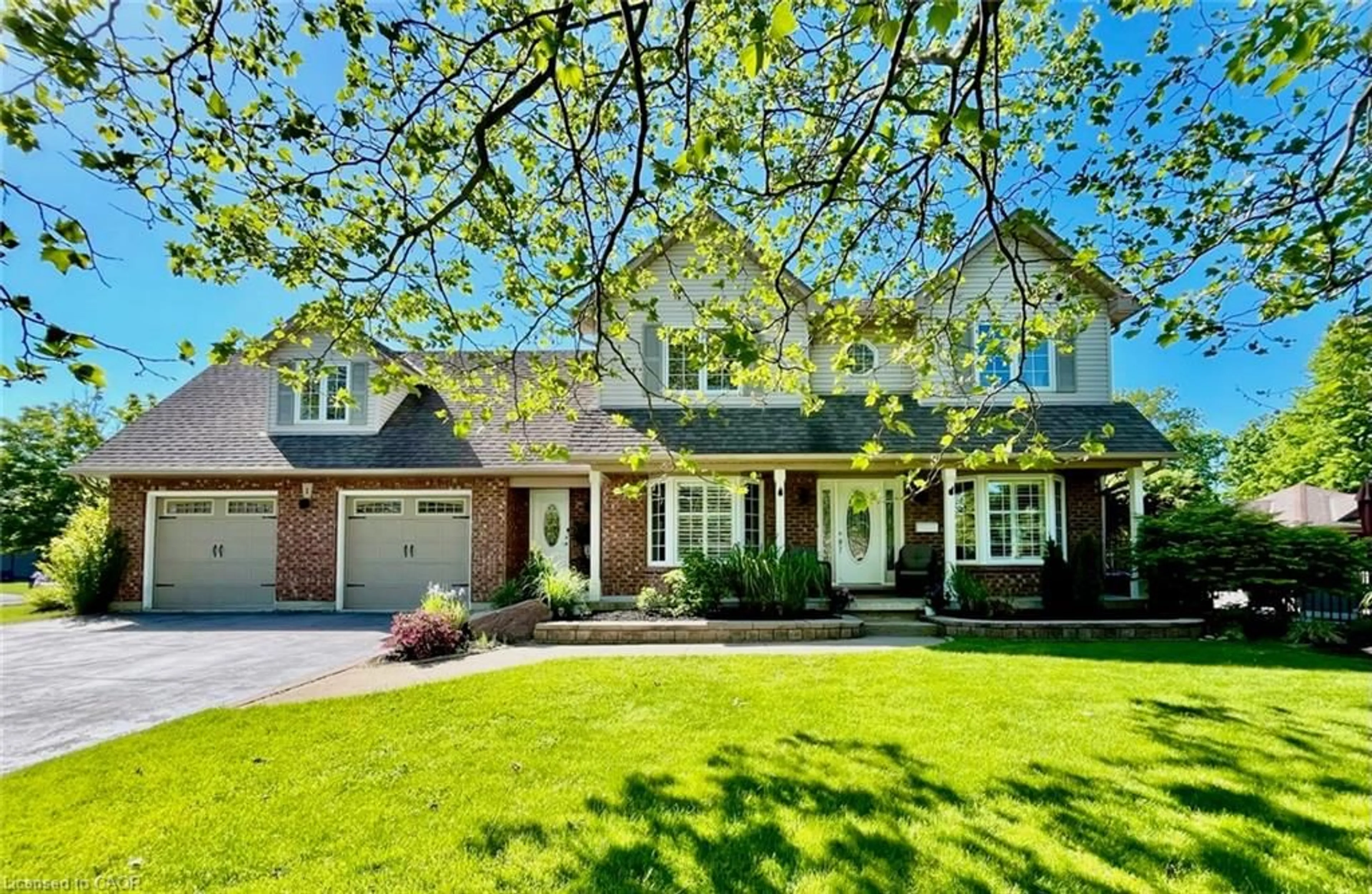 Home with brick exterior material, street for 1 Newport Lane, Port Dover Ontario N0A 1N7