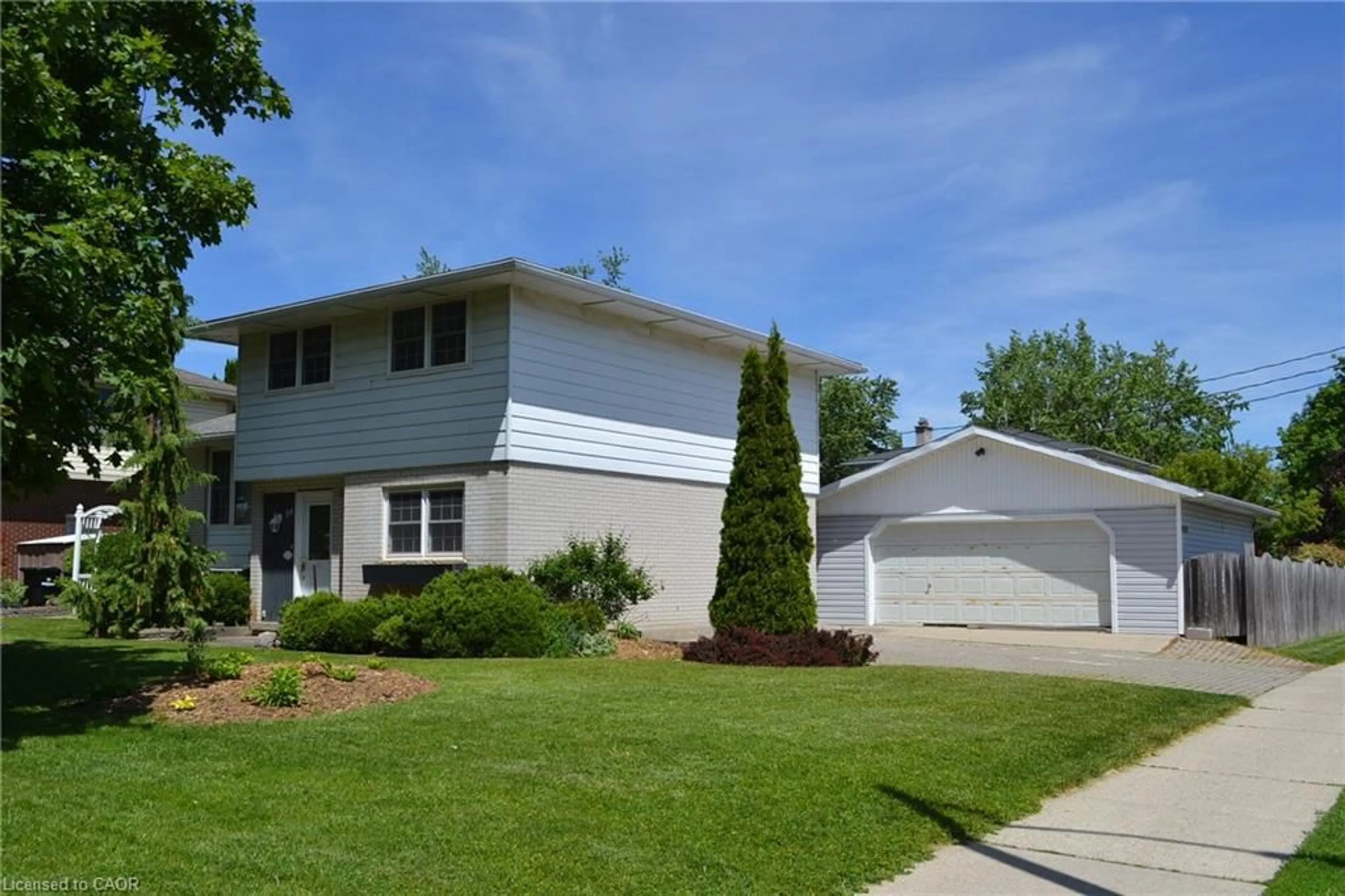 Home with vinyl exterior material, street for 94 First Street West St, Elmira Ontario N3B 1G9