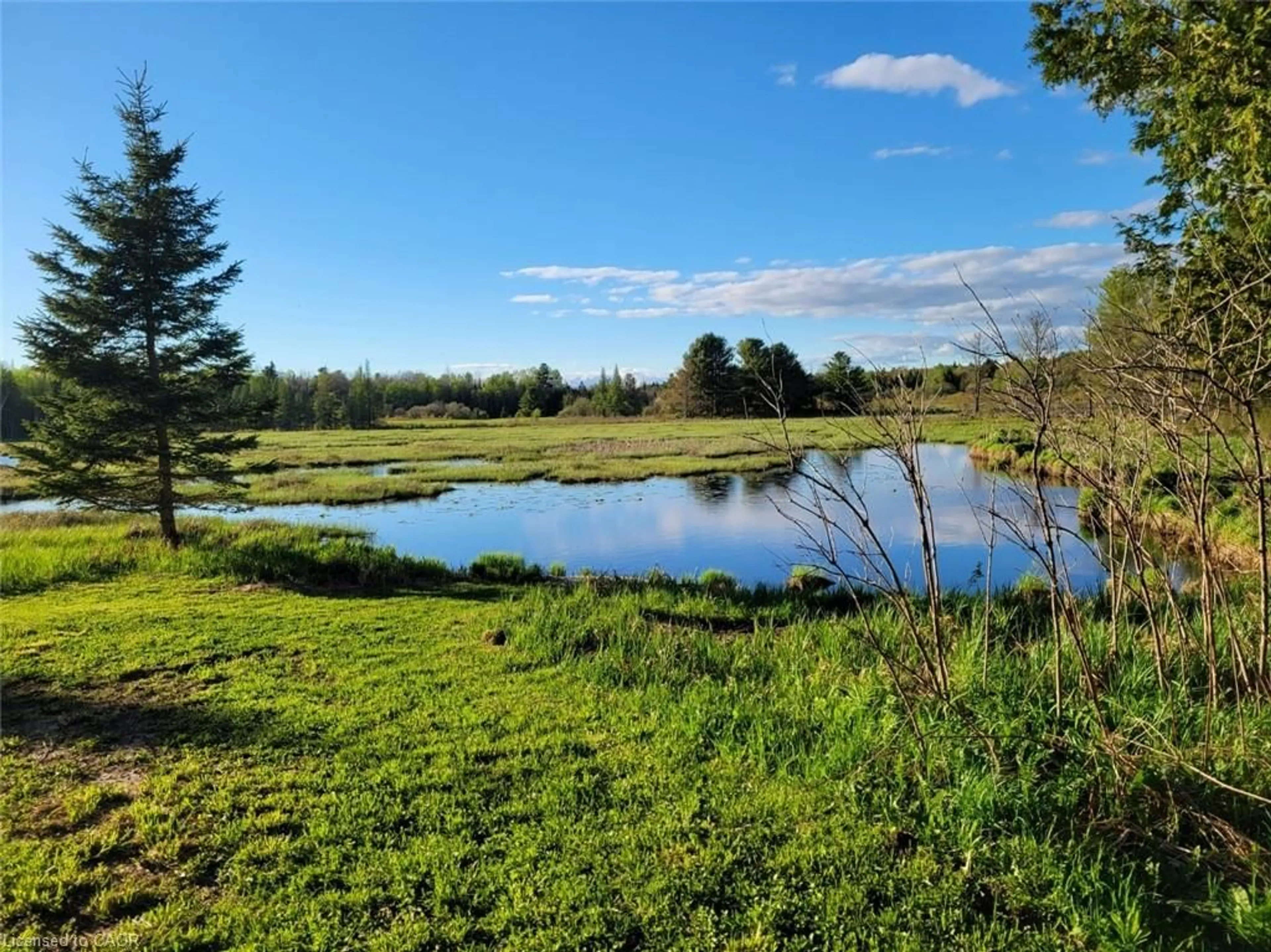 A pic from outside/outdoor area/front of a property/back of a property/a pic from drone, water/lake/river/ocean view for 1006 Hurdville Rd, McKellar Ontario P2A 0B5