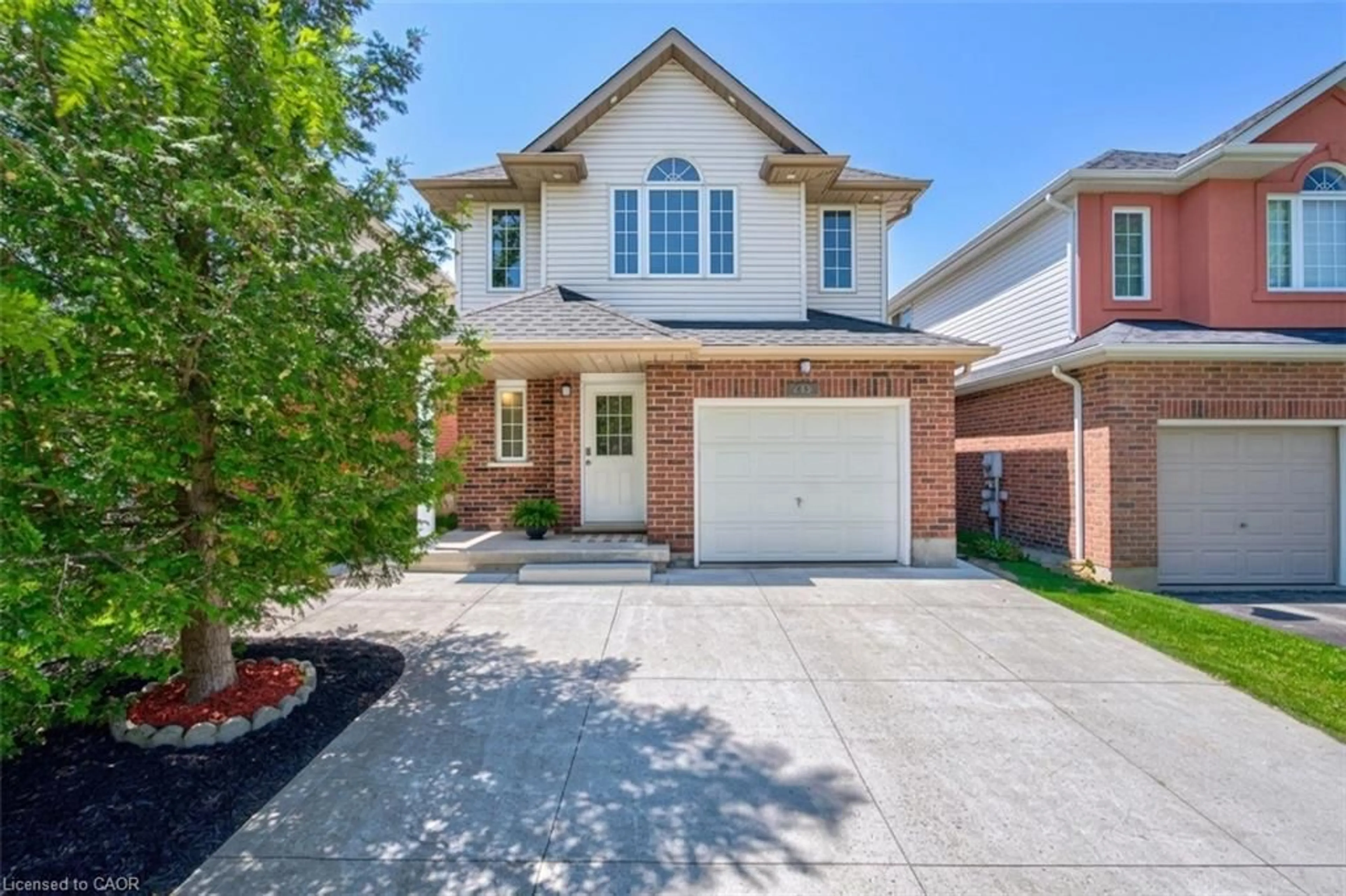 Home with brick exterior material, street for 223 Buttercup Crt, Waterloo Ontario N2V 2W8