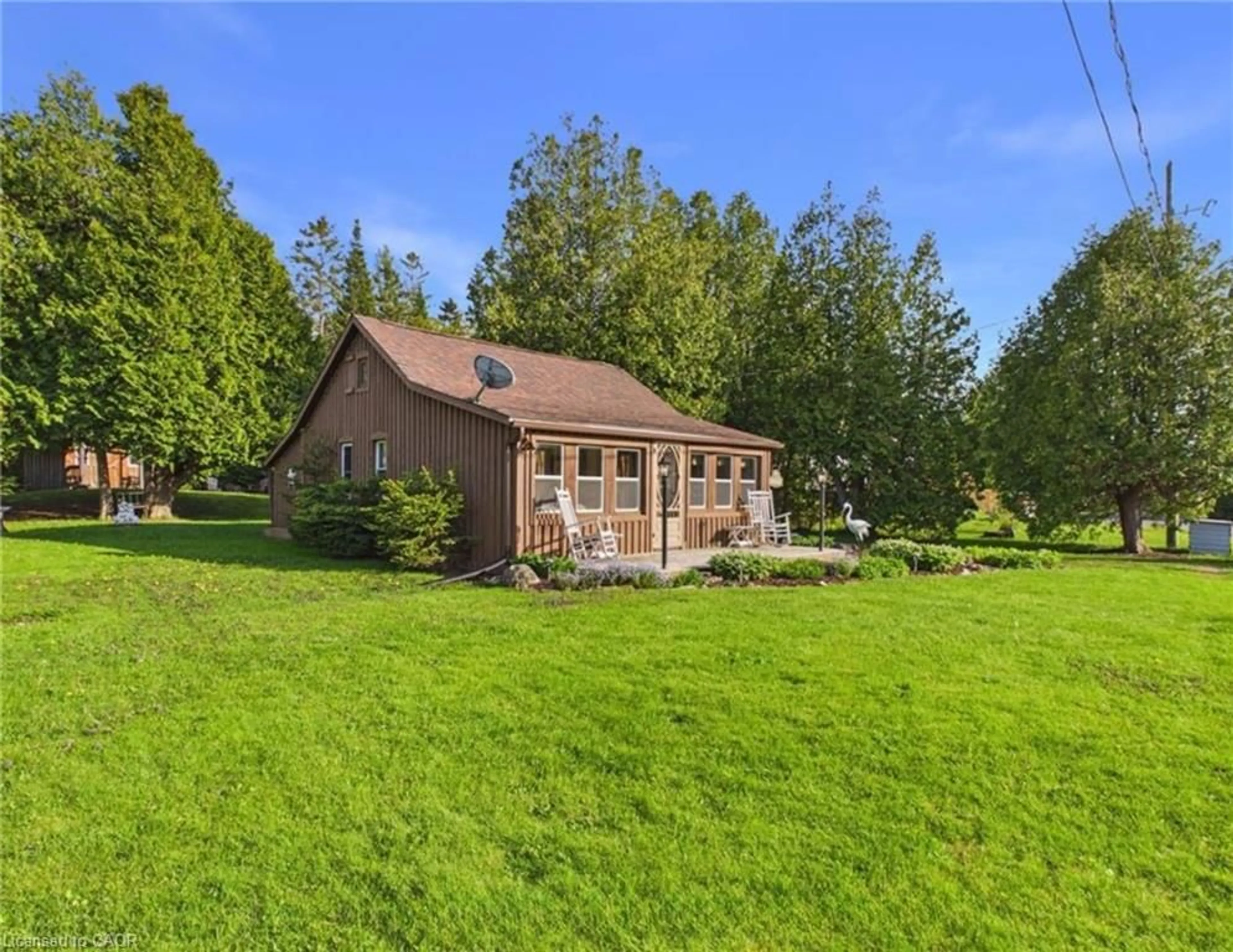 A pic from outside/outdoor area/front of a property/back of a property/a pic from drone, water/lake/river/ocean view for 857 Pike Bay Rd, North Bruce Peninsula Ontario N0H 2T0
