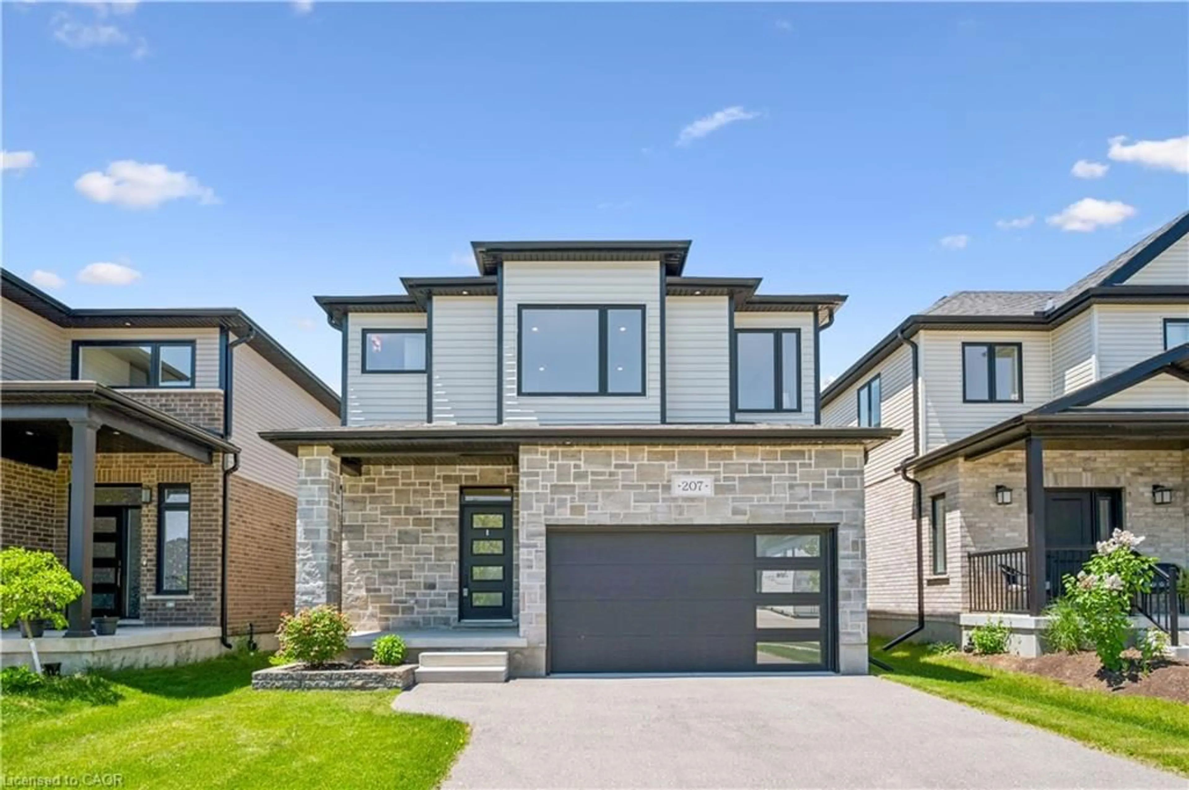 Home with brick exterior material, street for 207 Timber Trail Rd, Elmira Ontario N3B 0E4