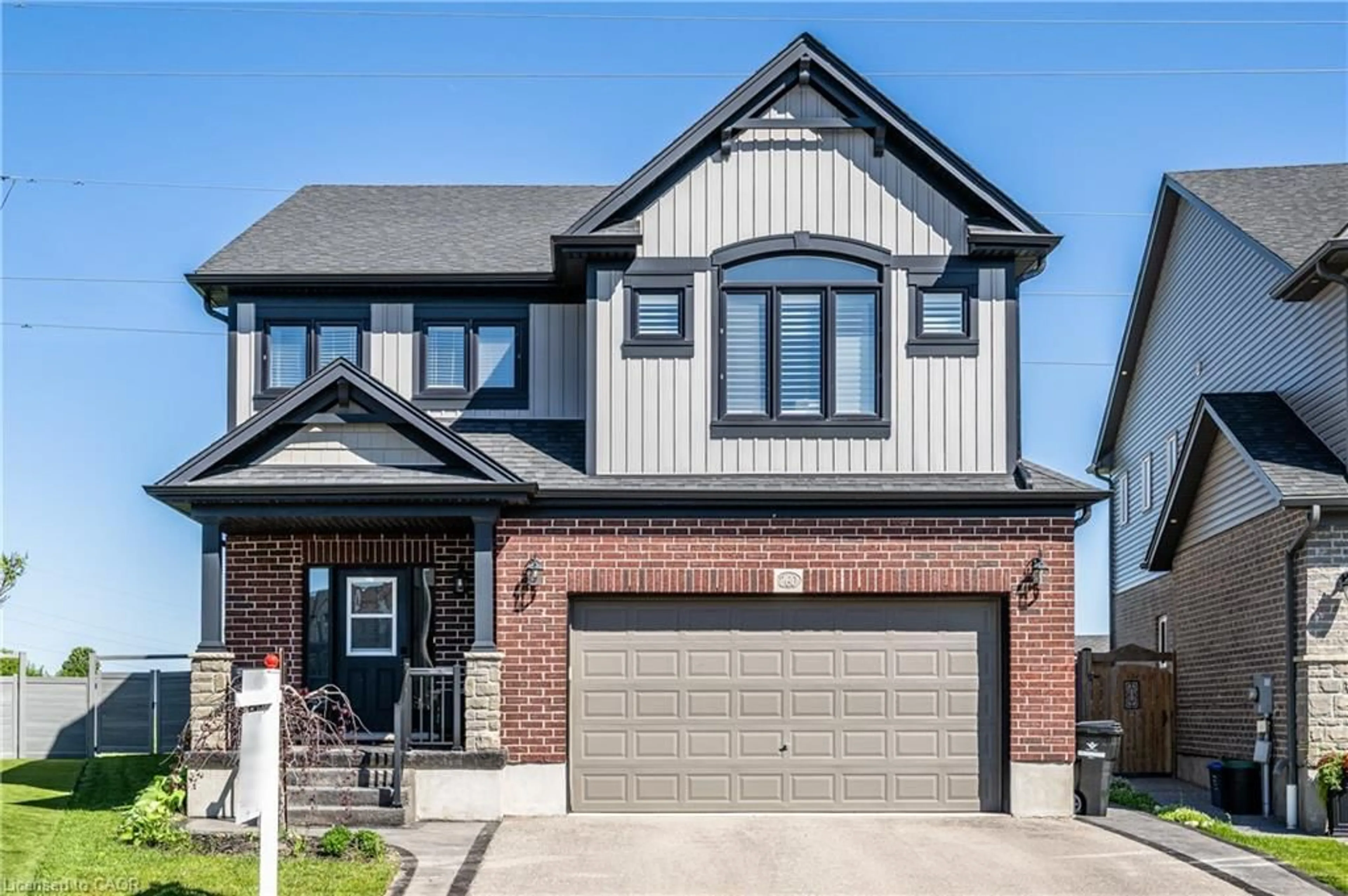 Home with brick exterior material, street for 260 Dewdrop Cres, Waterloo Ontario N2V 0A9