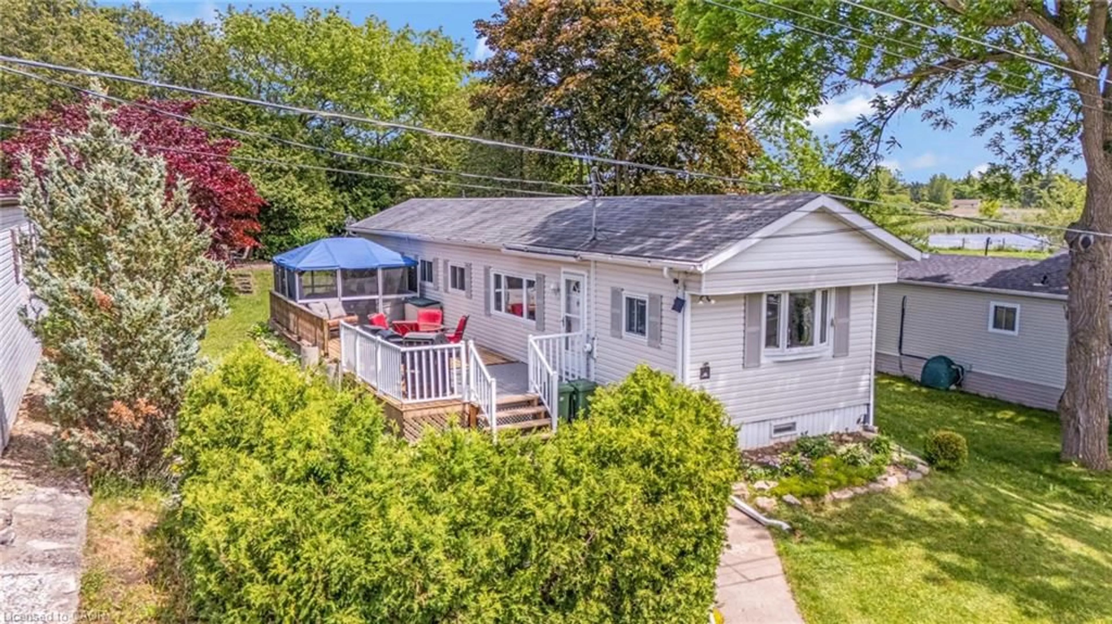 A pic from outside/outdoor area/front of a property/back of a property/a pic from drone, street for 49 Park Lane, Flamborough Ontario N0B 2J0
