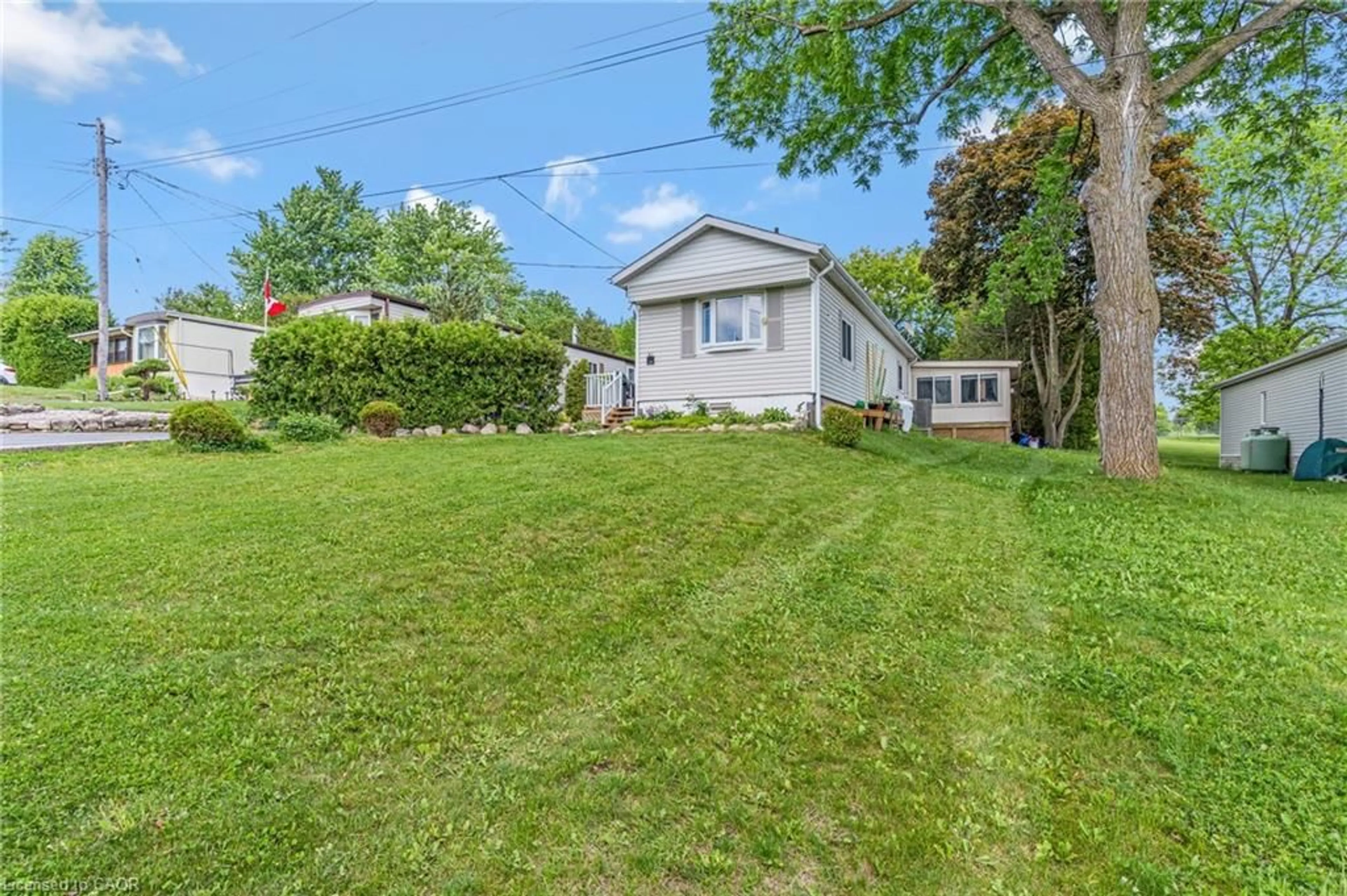 A pic from outside/outdoor area/front of a property/back of a property/a pic from drone, street for 49 Park Lane, Flamborough Ontario N0B 2J0