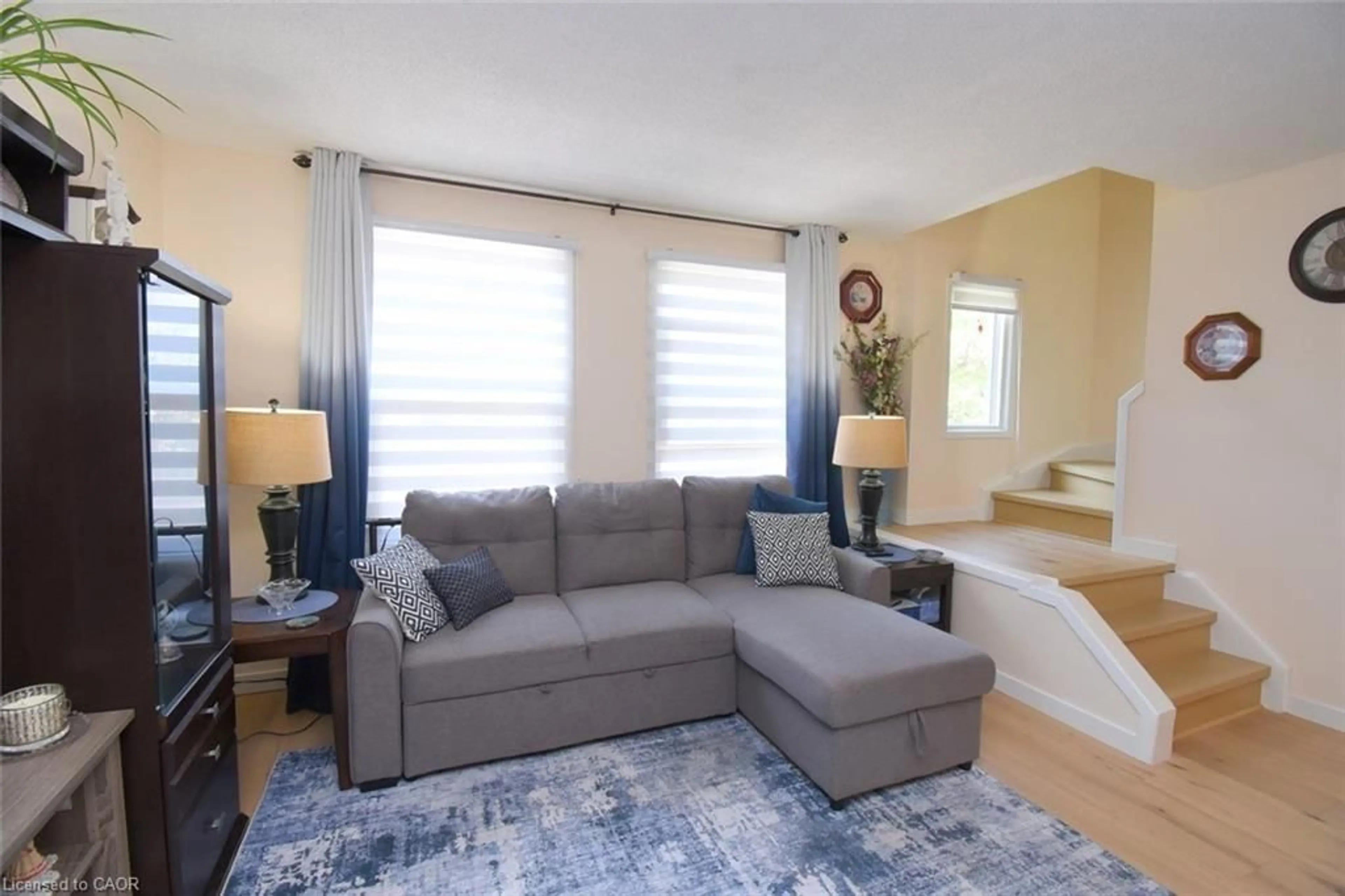 Living room with furniture, unknown for 1255 Upper Gage Ave #2, Hamilton Ontario L8W 3C7