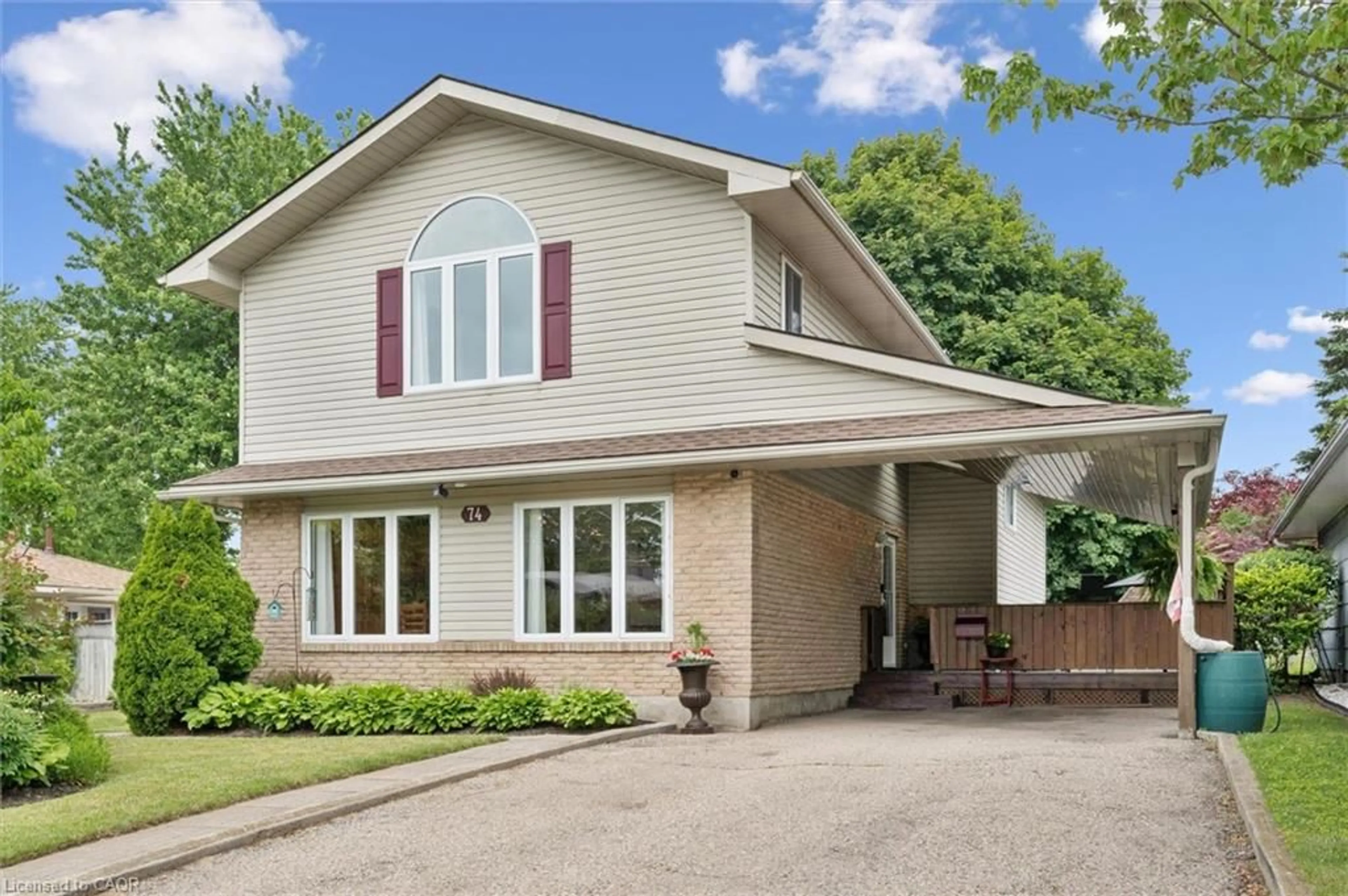 Home with vinyl exterior material, street for 74 Calmcrest Dr, Kitchener Ontario N2E 1V3