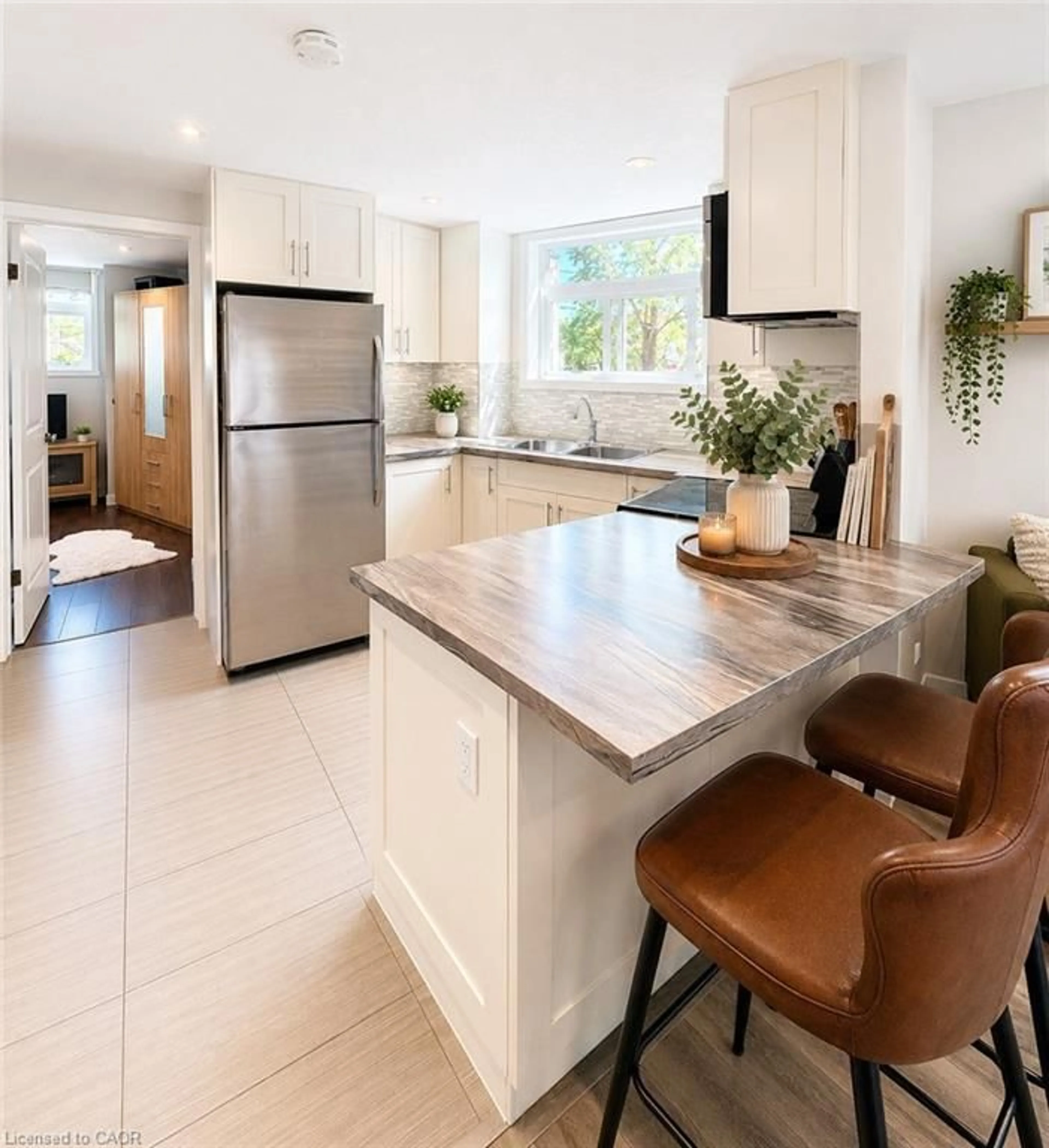 Open concept kitchen, ceramic/tile floor for 489 East Ave #A, Kitchener Ontario N2H 1Z7