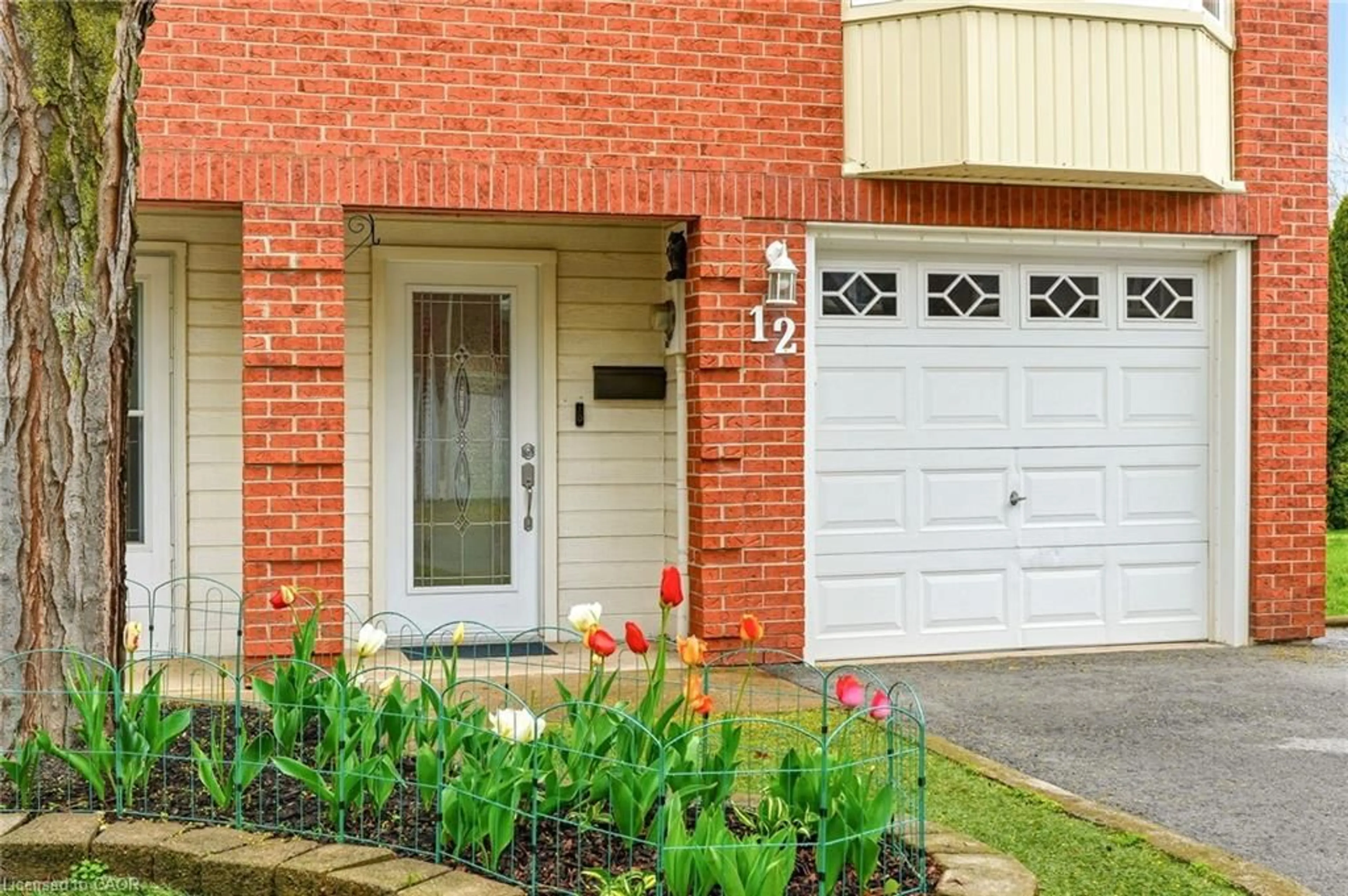 Home with brick exterior material, street for 130 Livingston Ave #12, Grimsby Ontario L3M 4W5