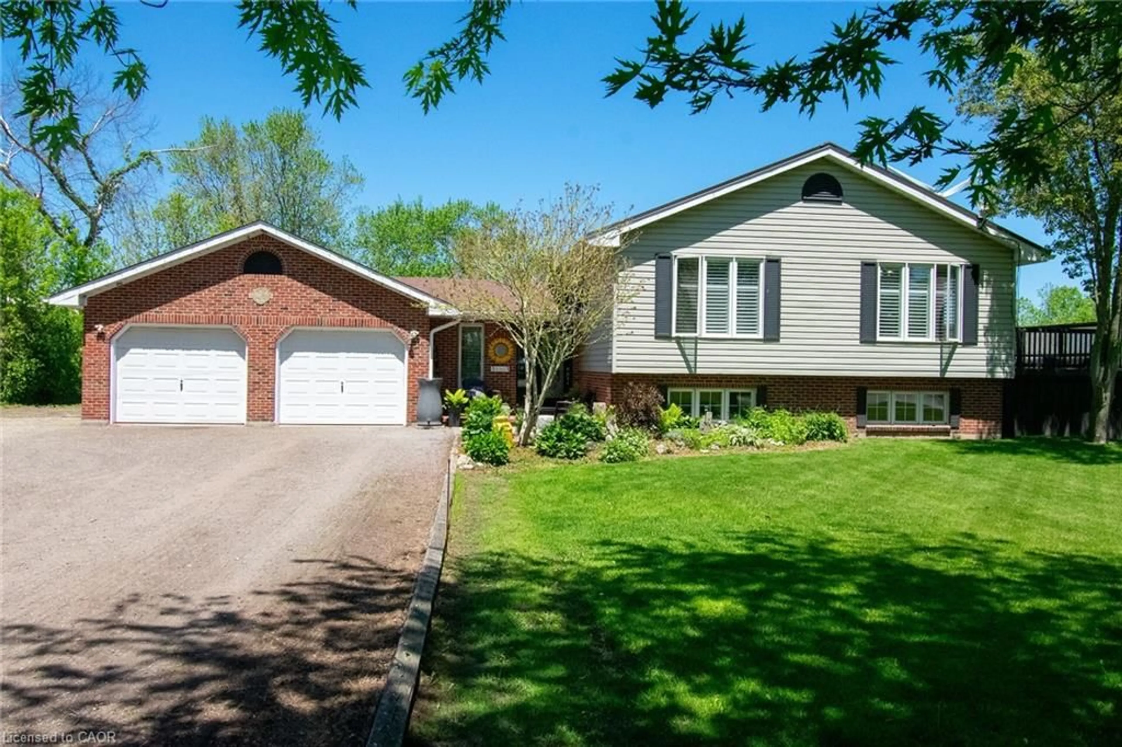 Home with brick exterior material, street for 2923 North Shore Dr, Lowbanks Ontario N0A 1K0