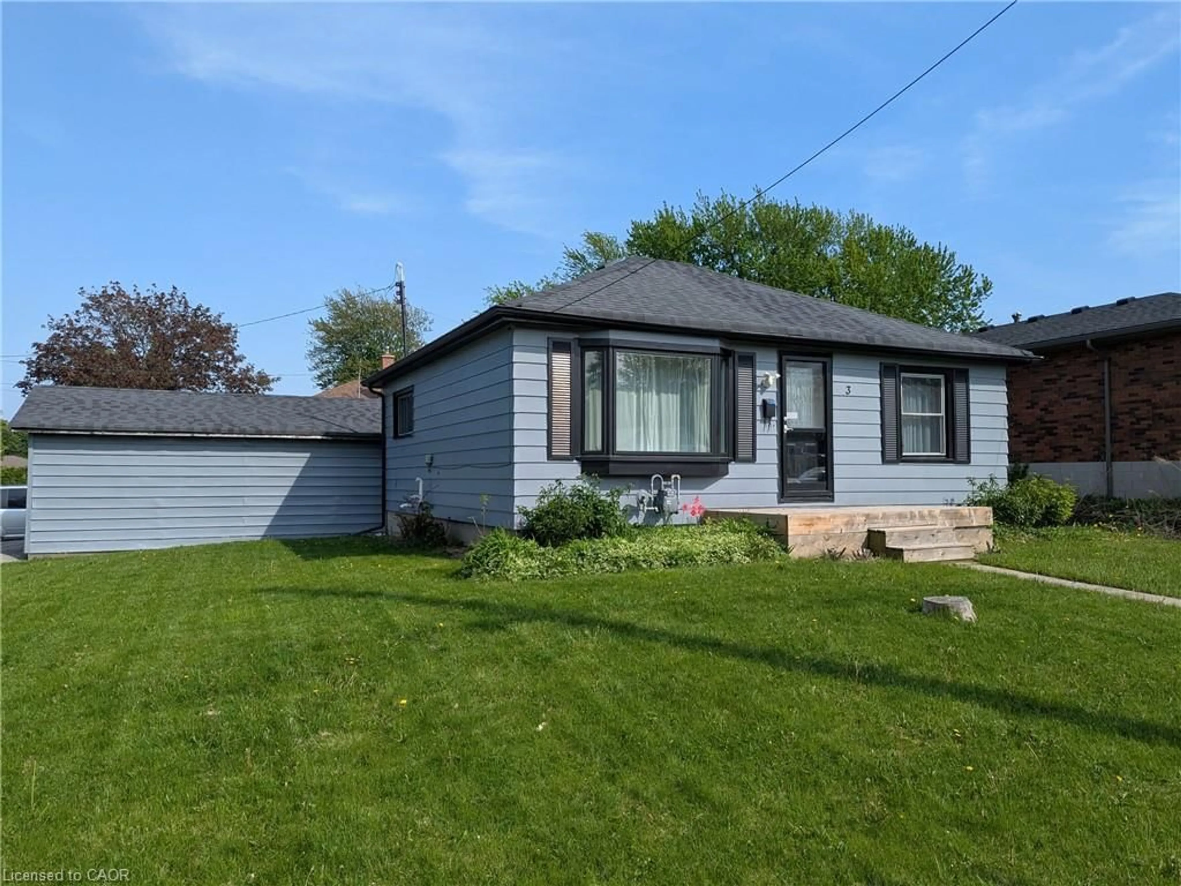 Home with vinyl exterior material, street for 3 Maitland Ave, Hamilton Ontario L9A 3J4